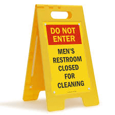 A wet floor sandwich board that says "DO NOT ENTER – MEN'S RESTROOM CLOSED FOR CLEANING"