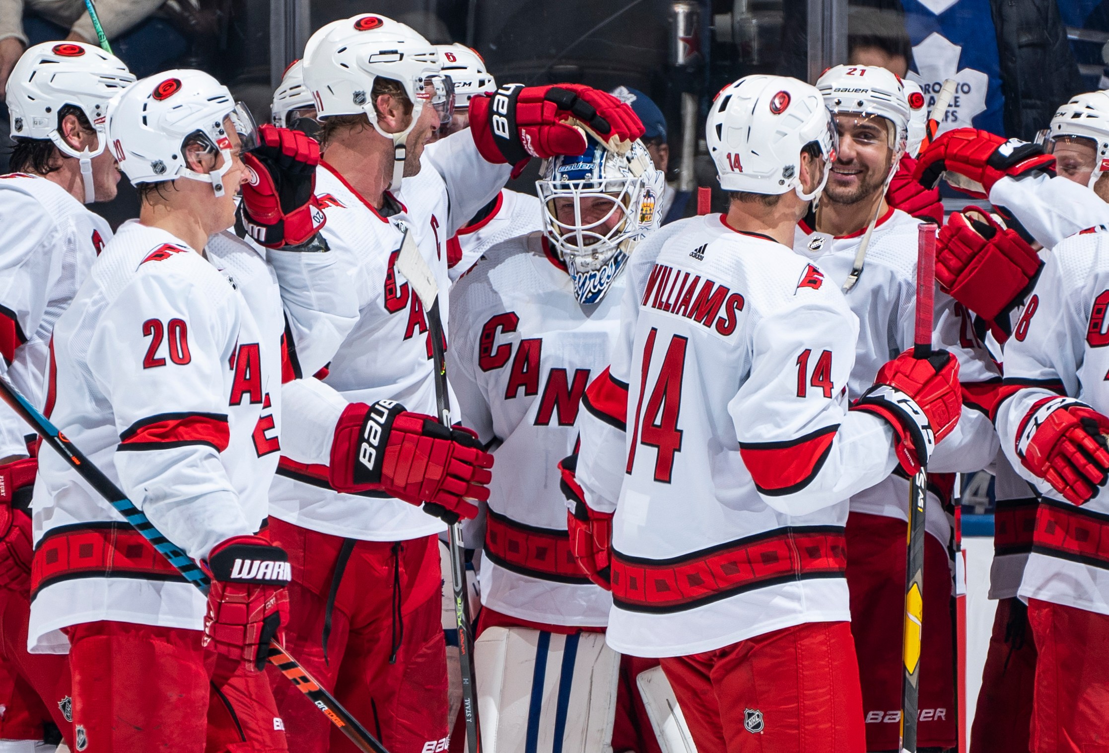TORONTO, ON - FEBRUARY 22: Emergency backup goaltender Dave Ayres #90 of the Carolina Hurricanes celebrates with teammates after defeating the Toronto Maple Leafs at the Scotiabank Arena on February 22, 2020 in Toronto, Ontario, Canada. (Photo by Kevin Sousa/NHLI via Getty Images)