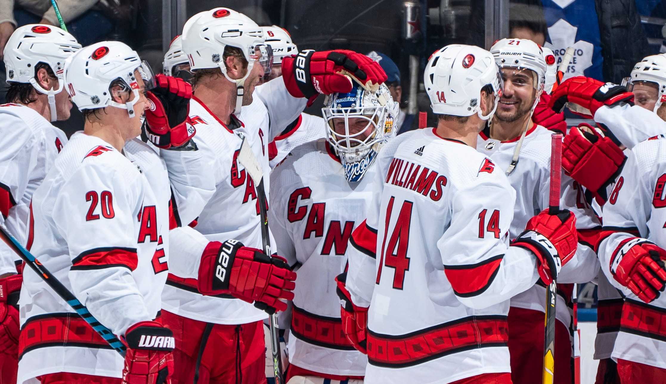 TORONTO, ON - FEBRUARY 22: Emergency backup goaltender Dave Ayres #90 of the Carolina Hurricanes celebrates with teammates after defeating the Toronto Maple Leafs at the Scotiabank Arena on February 22, 2020 in Toronto, Ontario, Canada. (Photo by Kevin Sousa/NHLI via Getty Images)