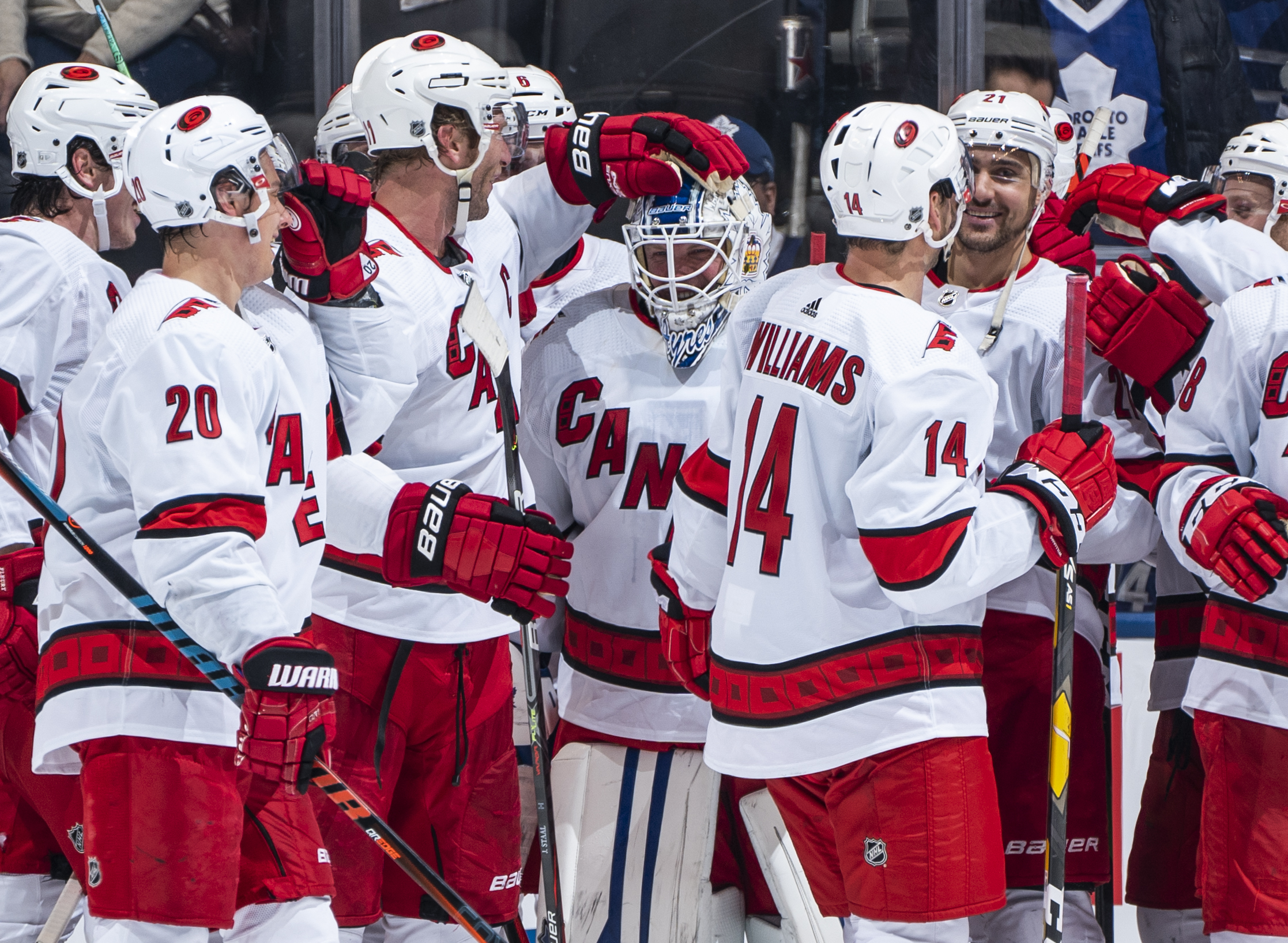 TORONTO, ON - FEBRUARY 22: Emergency backup goaltender Dave Ayres #90 of the Carolina Hurricanes celebrates with teammates after defeating the Toronto Maple Leafs at the Scotiabank Arena on February 22, 2020 in Toronto, Ontario, Canada. (Photo by Kevin Sousa/NHLI via Getty Images)