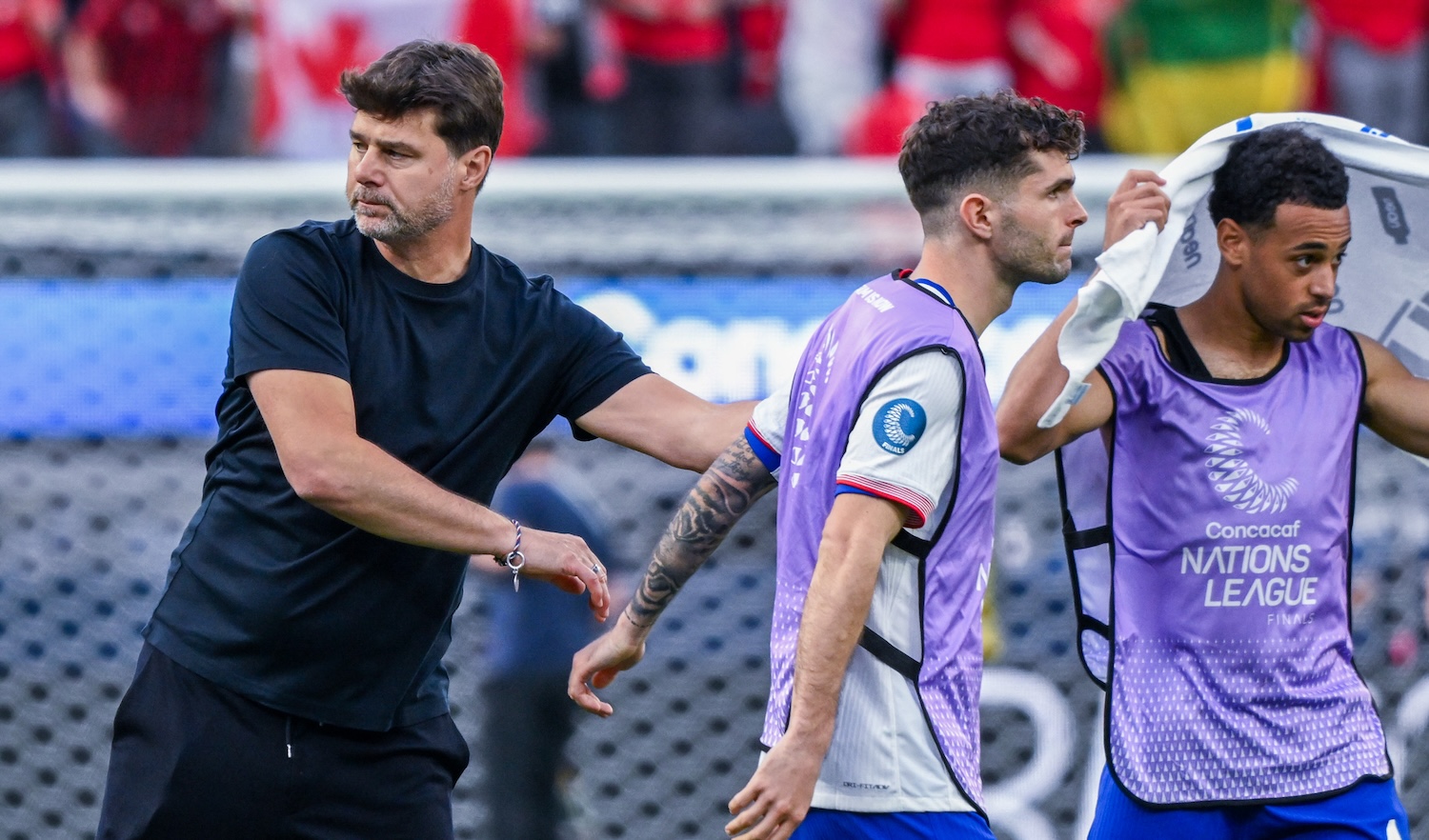 INGLEWOOD, CALIFORNIA - MARCH 23: United States head coach Mauricio Pochettino, Christian Pulisic #10, and Tyler Adams #4 on the field after playing Canada in the CONCACAF Nations League third place match at SoFi Stadium on March 23, 2025 in Inglewood, California. (Photo by Shaun Clark/ISI Photos/USSF/Getty Images for USSF)