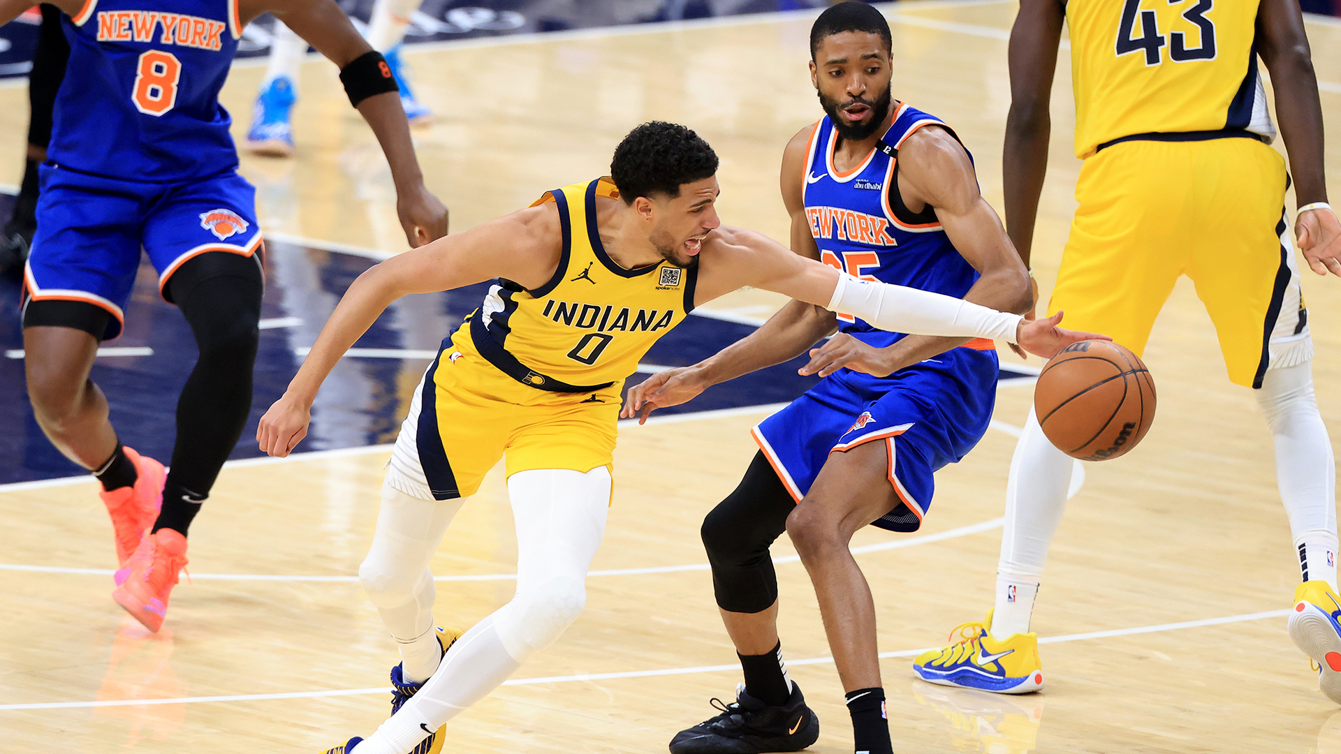 Tyrese Haliburton #0 of the Indiana Pacers grabs the ball against Mikal Bridges #25 of the New York Knicks during the first quarter in Game Six of the Eastern Conference Finals of the 2025 NBA Playoffs at Gainbridge Fieldhouse on May 31, 2025 in Indianapolis, Indiana.