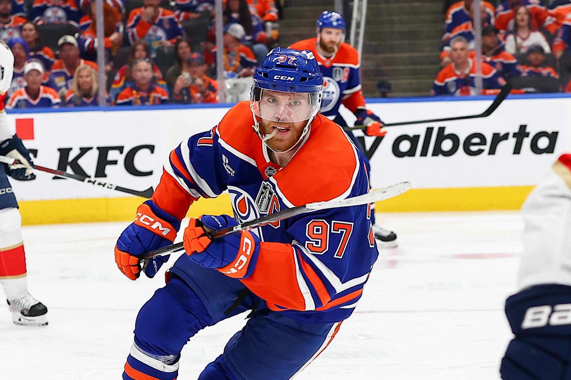 EDMONTON, AB - JUNE 06: Edmonton Oilers Center Connor McDavid (97) races towards the puck in the third period in game two of Stanley Cup Final Edmonton Oilers game versus the Florida Panthers on June 06, 2025 at Rogers Place in Edmonton, AB. (Photo by Curtis Comeau/Icon Sportswire via Getty Images)