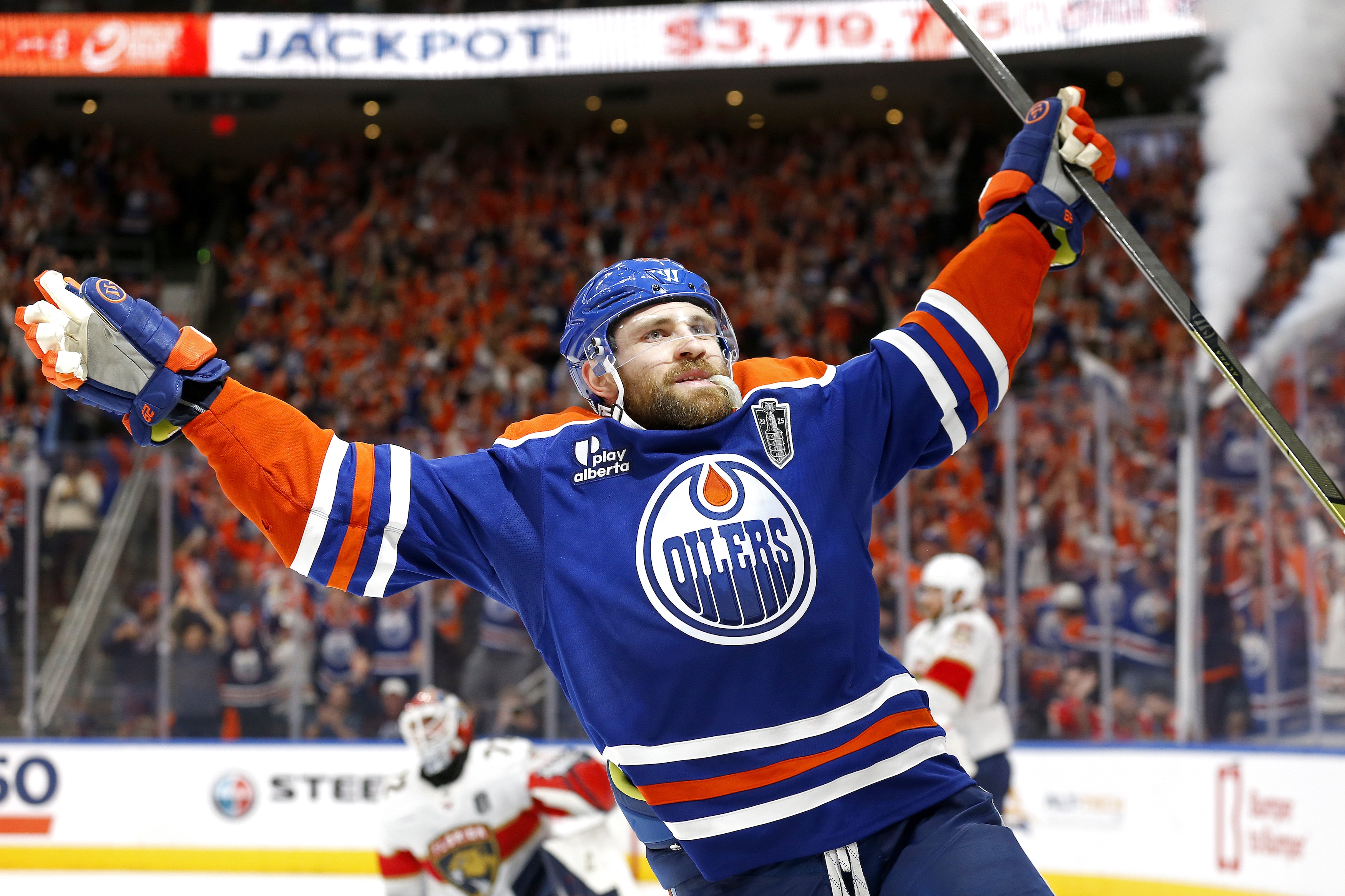 EDMONTON, CANADA - JUNE 04: Leon Draisaitl #29 of the Edmonton Oilers celebrates after scoring the game-winning goal to beat the Florida Panthers 4-3 during overtime in Game One of the 2025 Stanley Cup Final at Rogers Place on June 04, 2025 in Edmonton, Alberta, Canada. (Photo by Codie McLachlan/Getty Images)