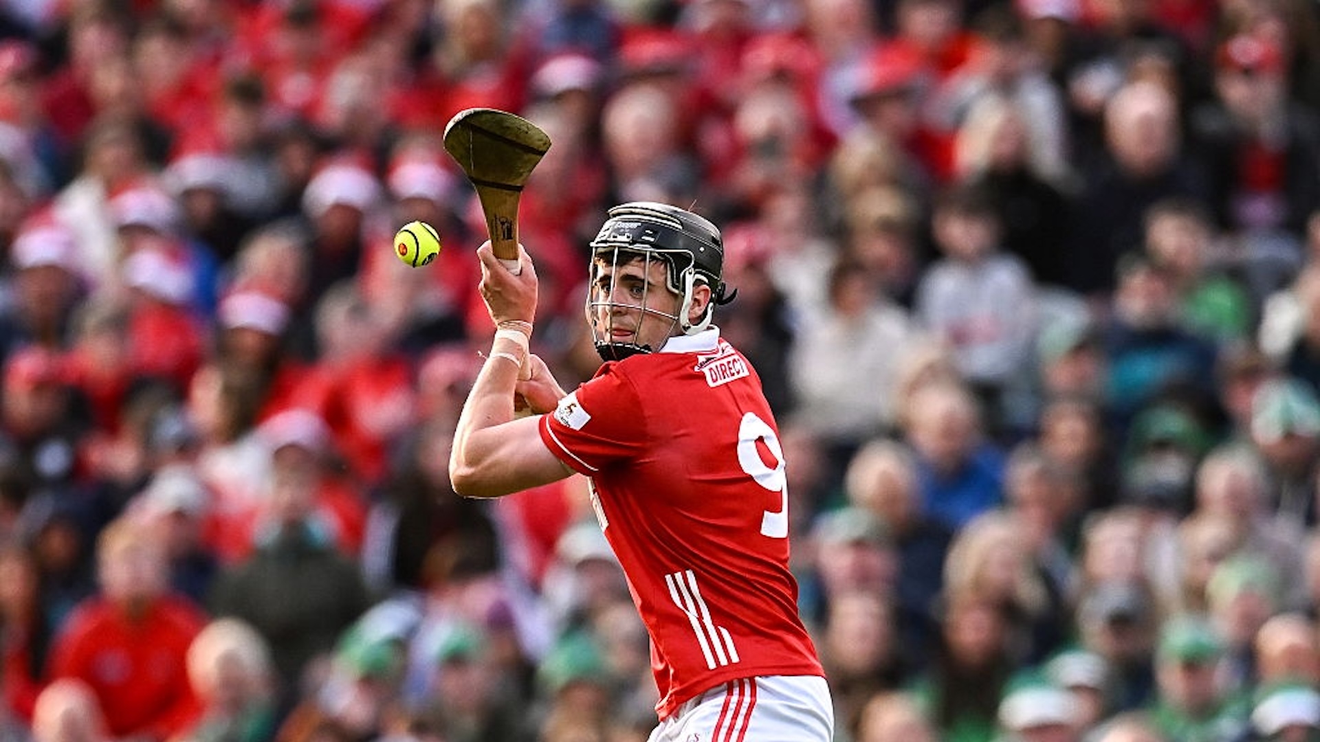 Darragh Fitzgibbon of Cork scores a point from a '65 in the last play of extra-time to send the match to a penalty shoot-out during the Munster GAA Hurling Senior Championship final match between Limerick and Cork at LIT Gaelic Grounds in Limerick.