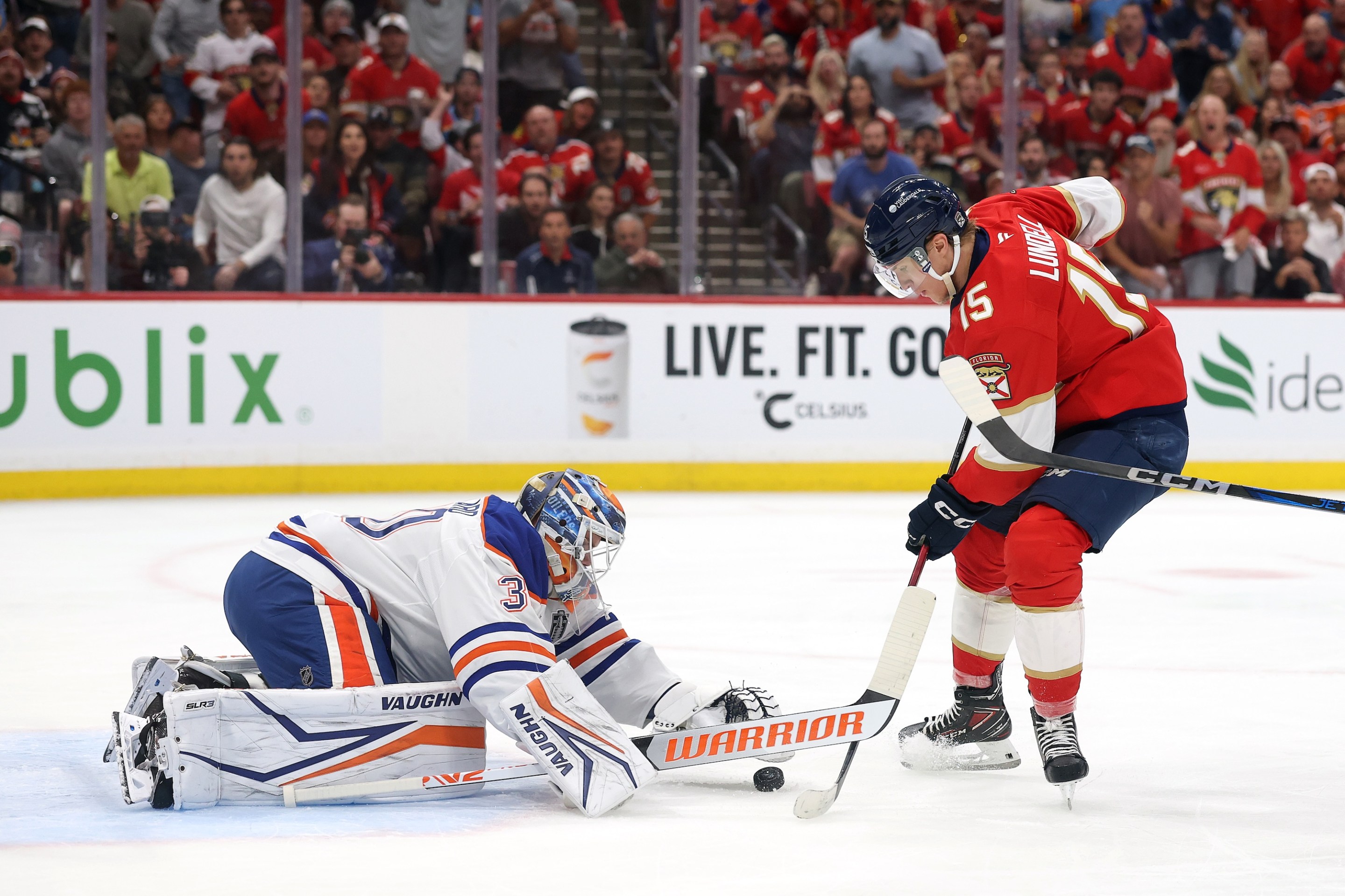 SUNRISE, FLORIDA - JUNE 12: Anton Lundell #15 of the Florida Panthers shoots on Calvin Pickard #30 of the Edmonton Oilers during the second period in Game Four of the 2025 Stanley Cup Final at Amerant Bank Arena on June 12, 2025 in Sunrise, Florida. (Photo by Steph Chambers/Getty Images)