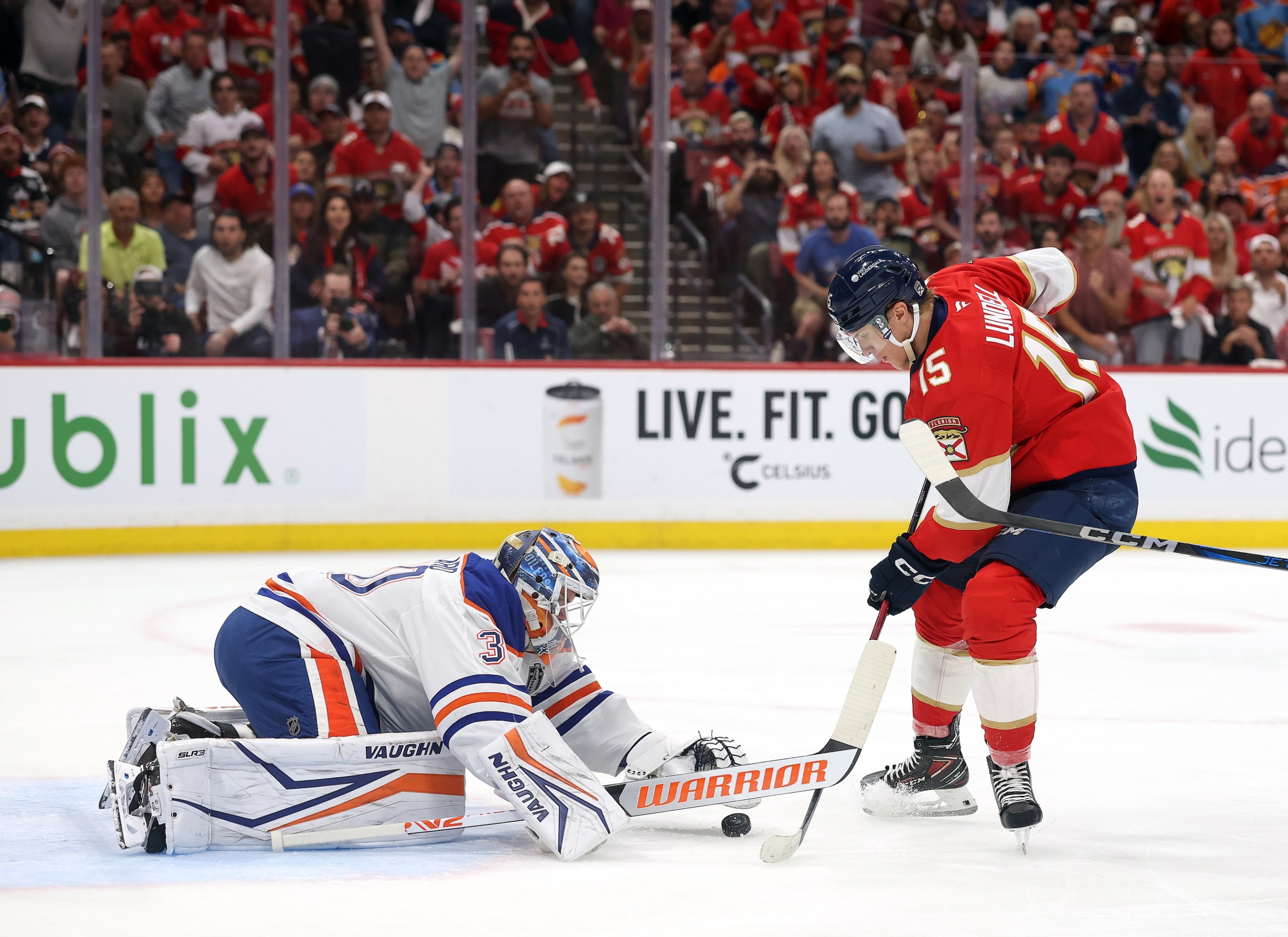 SUNRISE, FLORIDA - JUNE 12: Anton Lundell #15 of the Florida Panthers shoots on Calvin Pickard #30 of the Edmonton Oilers during the second period in Game Four of the 2025 Stanley Cup Final at Amerant Bank Arena on June 12, 2025 in Sunrise, Florida. (Photo by Steph Chambers/Getty Images)