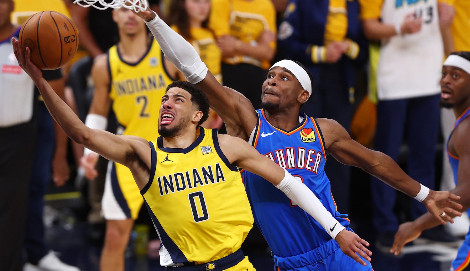 INDIANAPOLIS, INDIANA - JUNE 13: Tyrese Haliburton #0 of the Indiana Pacers attempts a layup against Shai Gilgeous-Alexander #2 of the Oklahoma City Thunder during the fourth quarter in Game Four of the 2025 NBA Finals at Gainbridge Fieldhouse on June 13, 2025 in Indianapolis, Indiana. NOTE TO USER: User expressly acknowledges and agrees that, by downloading and or using this photograph, User is consenting to the terms and conditions of the Getty Images License Agreement. (Photo by Maddie Meyer/Getty Images)