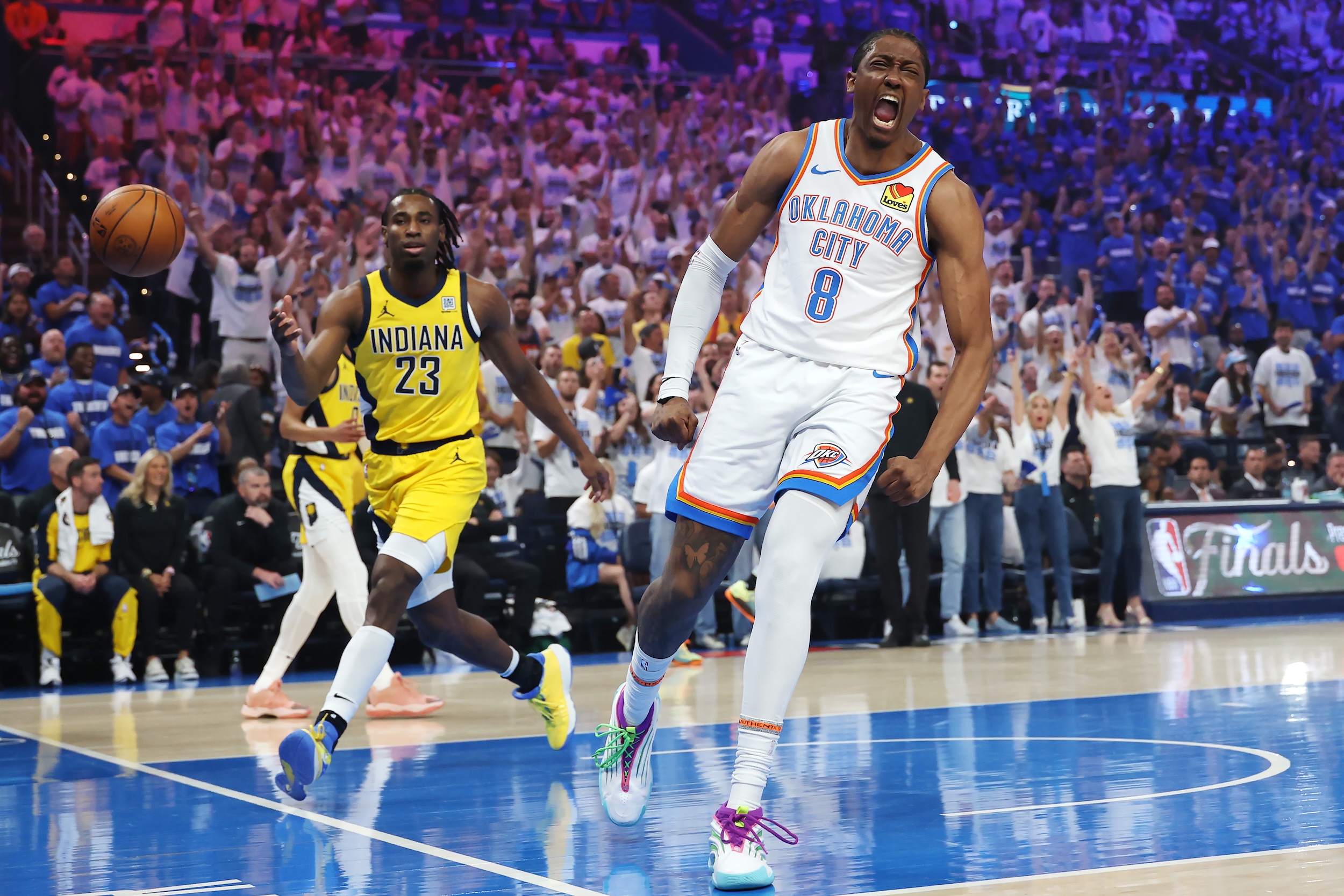 Jalen Williams celebrates a bucket.