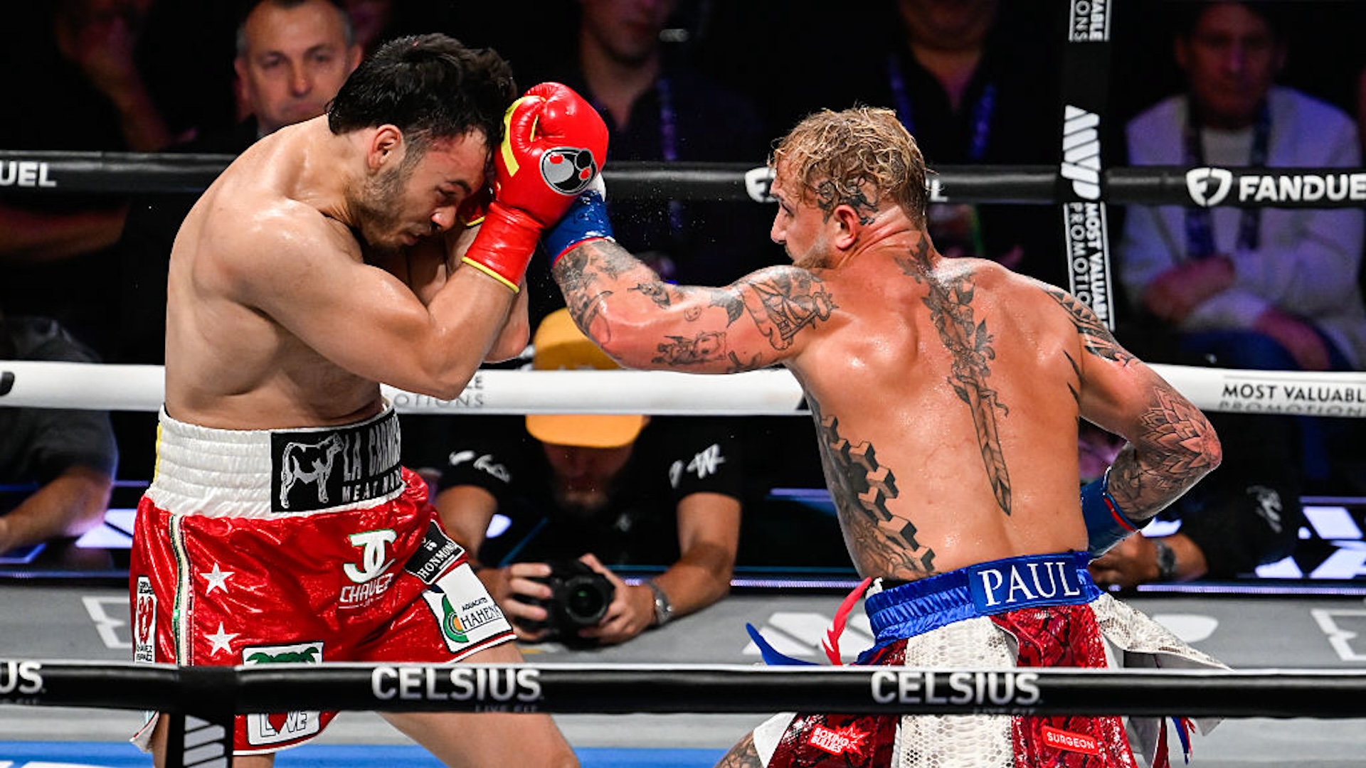 Jake Paul (Red-Blue &amp; white short) and Julio Cesar Chavez Jr. (Red &amp; White short) exchange punches during their cruiserweight bout of the Premiere Boxing Championship on Saturday night at Honda Center in Anaheim of Los Angeles County, California United States on June 28, 2025.