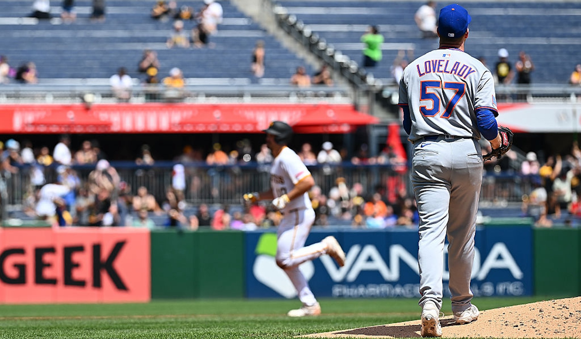 Richard Lovelady #57 of the New York Mets steps off the mound as Bryan Reynolds #10 of the Pittsburgh Pirates rounds the bases after hitting a solo home run in the fifth inning during the game at PNC Park on June 29, 2025 in Pittsburgh, Pennsylvania.