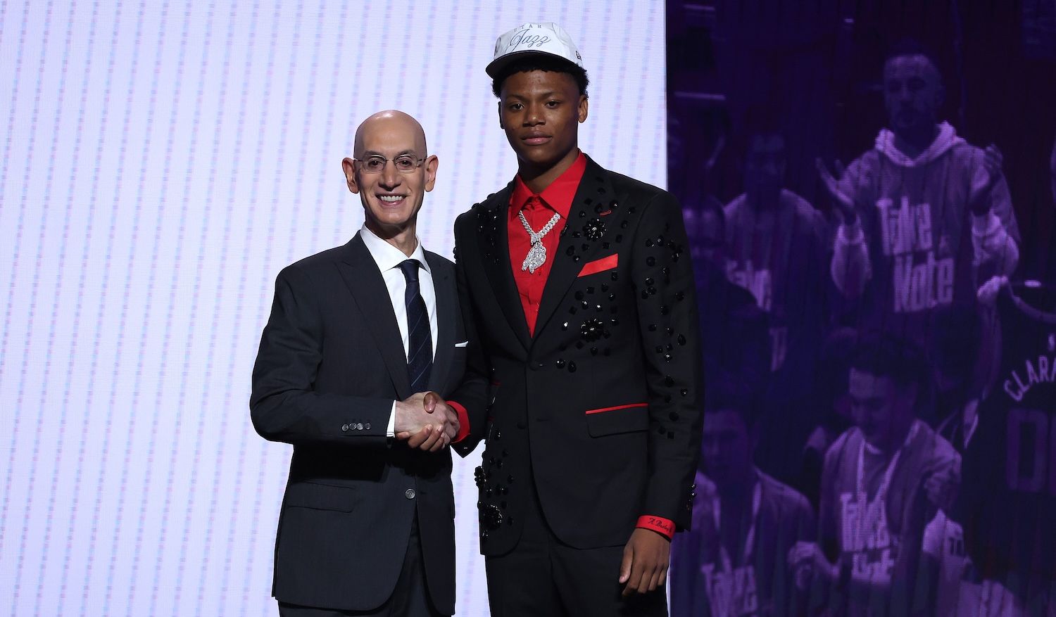 NEW YORK, NEW YORK - JUNE 25: Ace Bailey (R) shakes hands with NBA commissioner Adam Silver (L) after being drafted fifth overall by the Utah Jazz during the first round of the 2025 NBA Draft at Barclays Center on June 25, 2025 in the Brooklyn borough of New York City. NOTE TO USER: User expressly acknowledges and agrees that, by downloading and/or using this photograph, user is consenting to the terms and conditions of the Getty Images License Agreement. (Photo by Sarah Stier/Getty Images)
