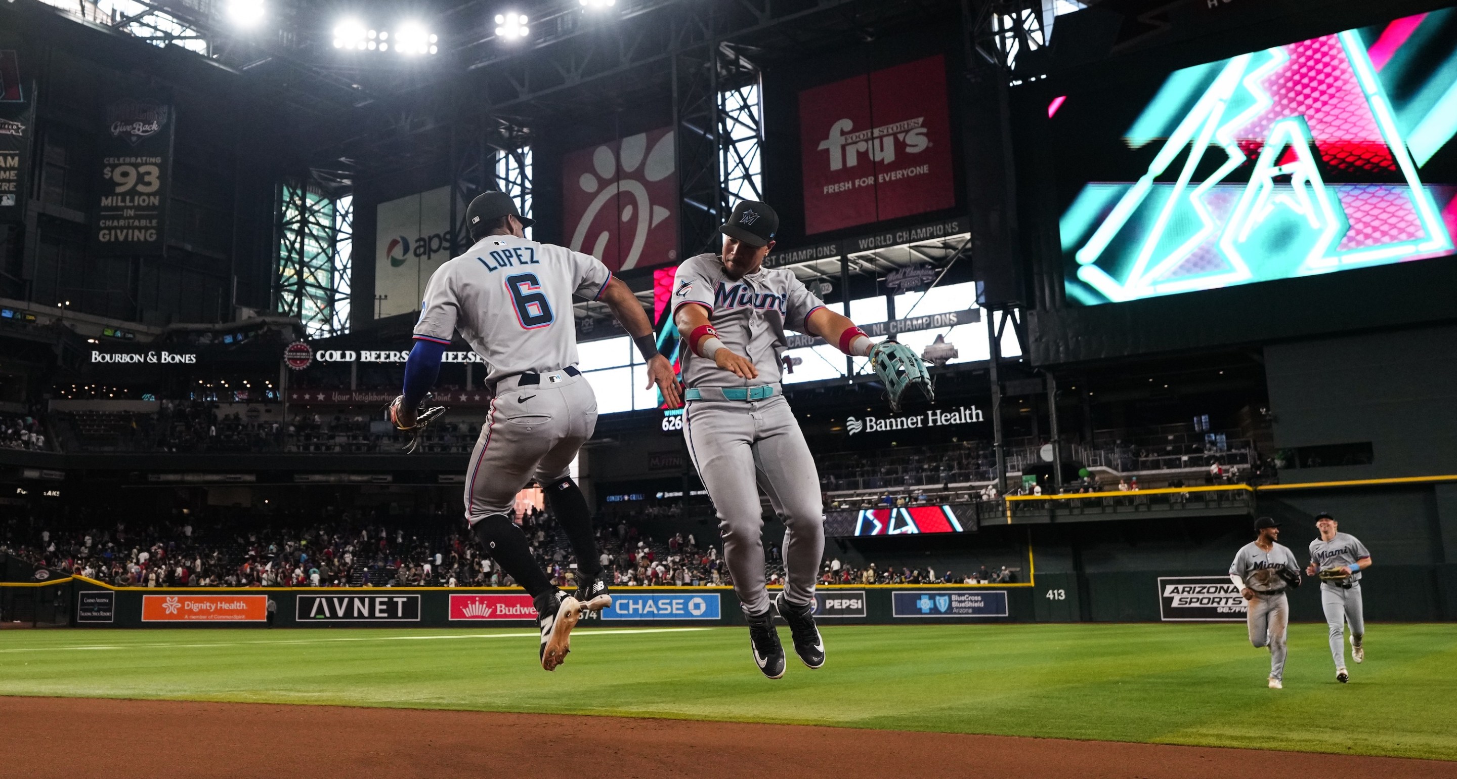 PHOENIX, ARIZONA - JUNE 28: Otto Lopez #6 of the Miami Marlins and Heriberto Hernandez #64 of the Miami Marlins celebrate after defeating the Arizona Diamondbacks at Chase Field on June 28, 2025 in Phoenix, Arizona. (Photo by Jasen Vinlove/Miami Marlins/Getty Images)