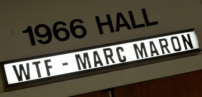 Atmosphere at the Bud Light Presents Wild West Comedy Festival - Marc Maron: WTF Podcast With Vince Vaughn at the Belcourt Theatre on May 15, 2014 in Nashville, Tennessee. The photo shows the sign for 1966 Hall and, underneath it, a sign saying "WTF - MARC MARON."