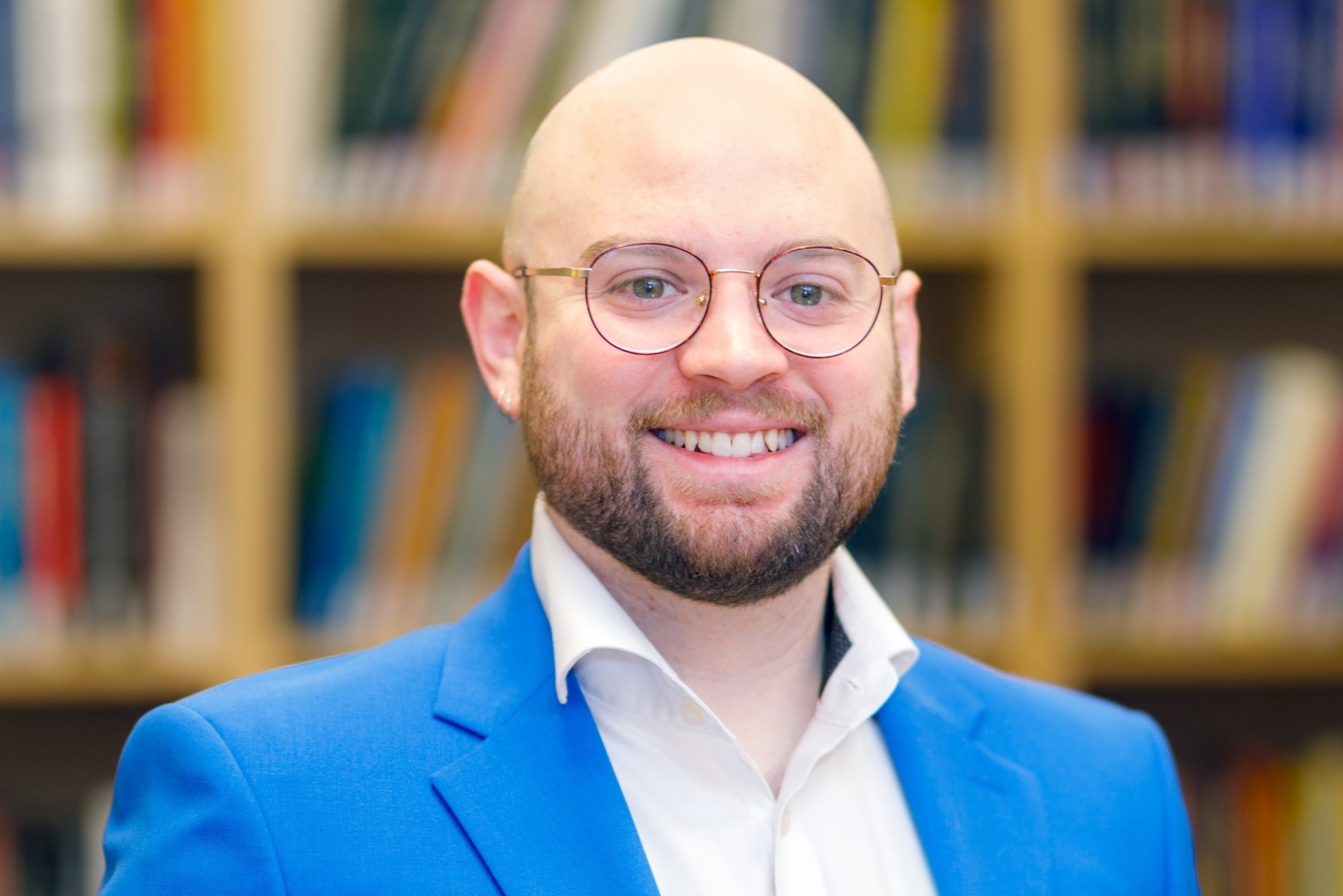 a photo of Patrick Kelly, a Doctoral Candidate at Brown University School of Public Health, whose NIH National Institute on Drug Abuse funded doctoral research was terminated