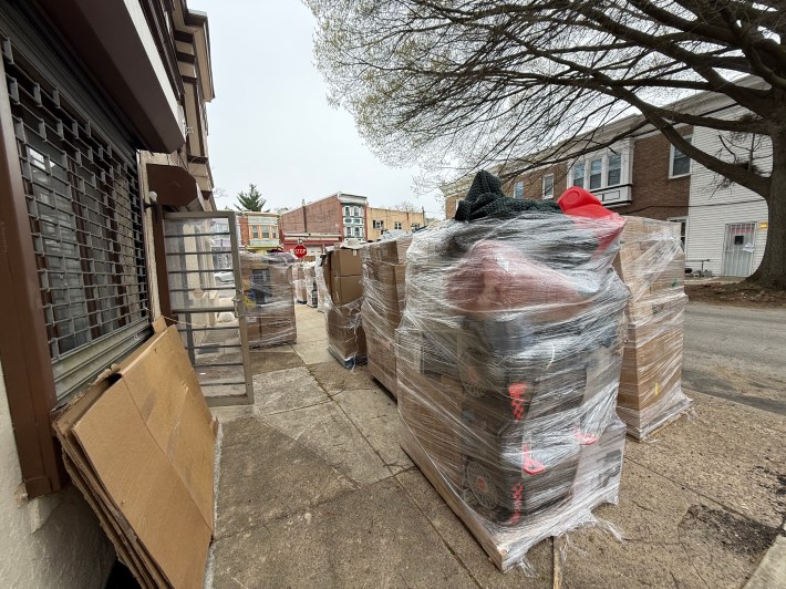 Shrinkwrapped pallets outside the bin store.