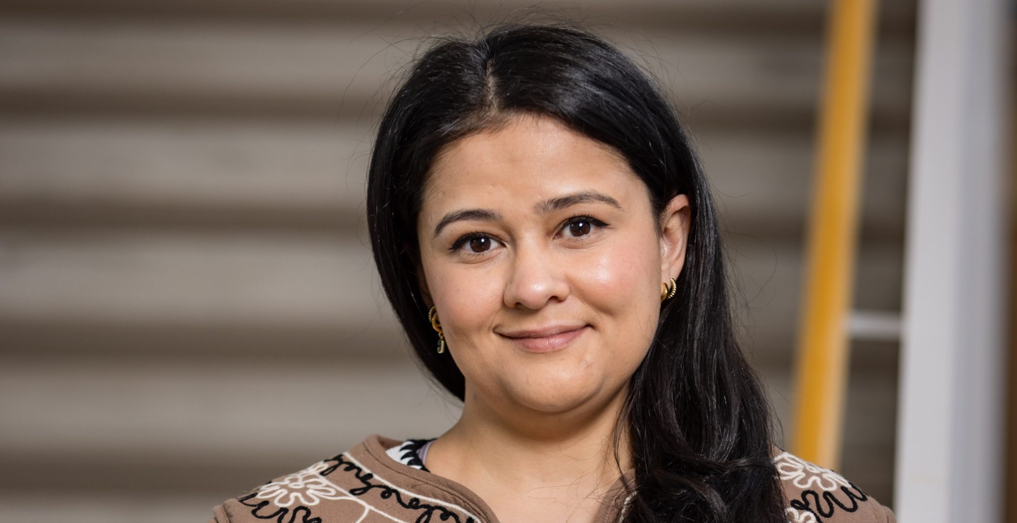 a headshot of Laura Mata López, a psychiatric nurse and doctoral student at Johns Hopkins University