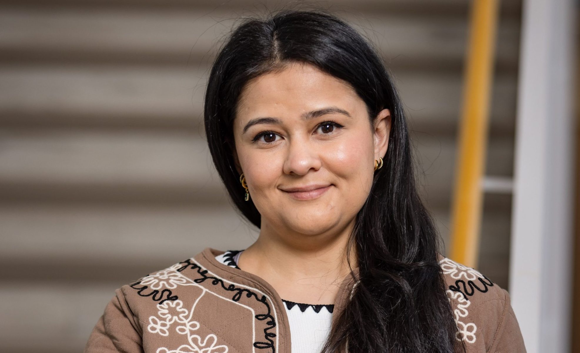 a headshot of Laura Mata López, a psychiatric nurse and doctoral student at Johns Hopkins University