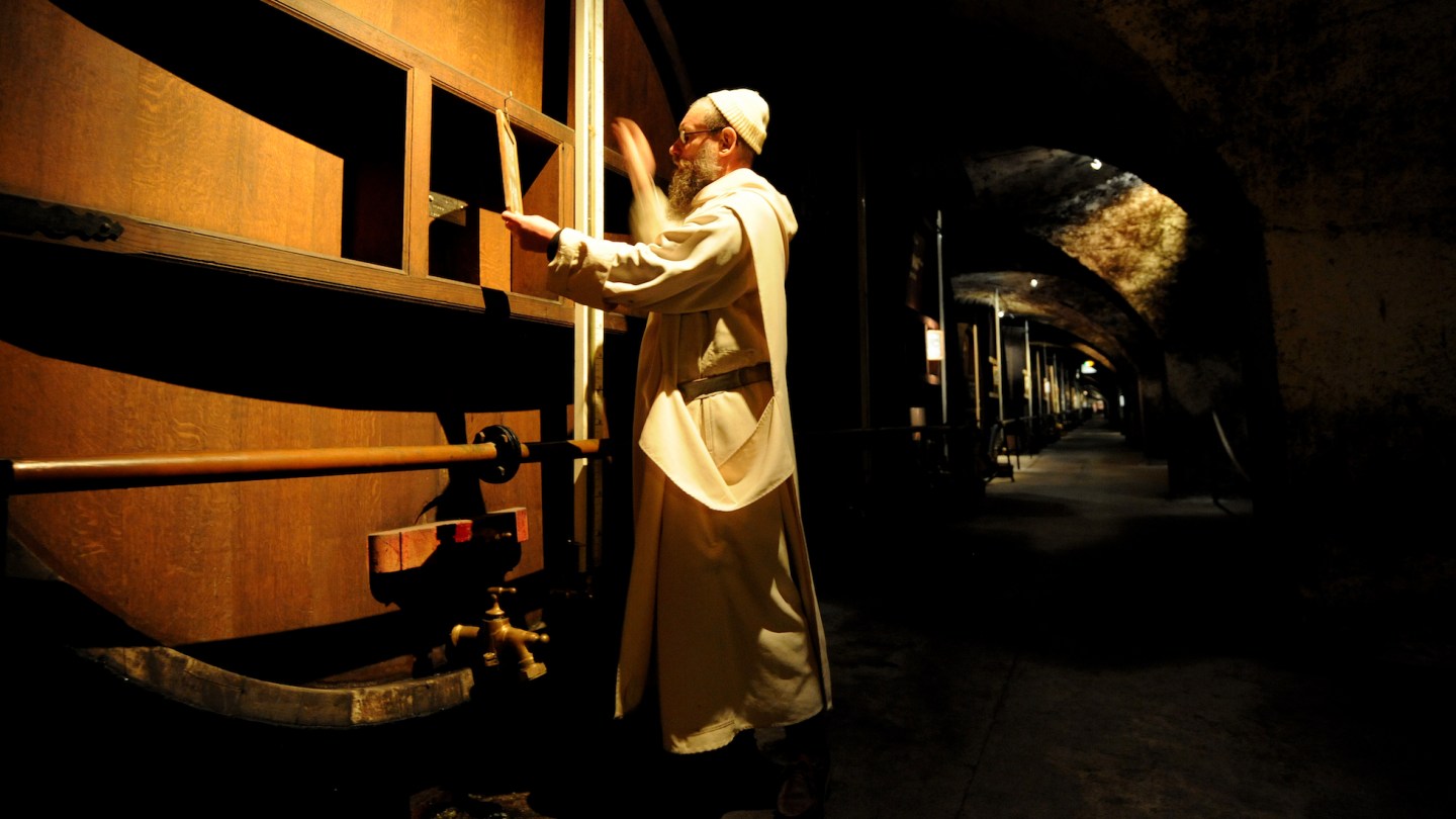 Brother Jean-Jacques, one of the two monks who knows the secret receip of the Chartreuse liqueur, checks the level of "foudres" (big barrels) of Chartreuse in the biggest liqueurs cellar in the world on November 25, 2011 in Voiron. The liqueur is named after the Monks' Grande Chartreuse monastery, located in the Chartreuse Mountains near Grenoble, French Alps. Chartreuse gives its name to the color chartreuse. It is one of the handful of liquors that continues to age and improve in the bottle.
