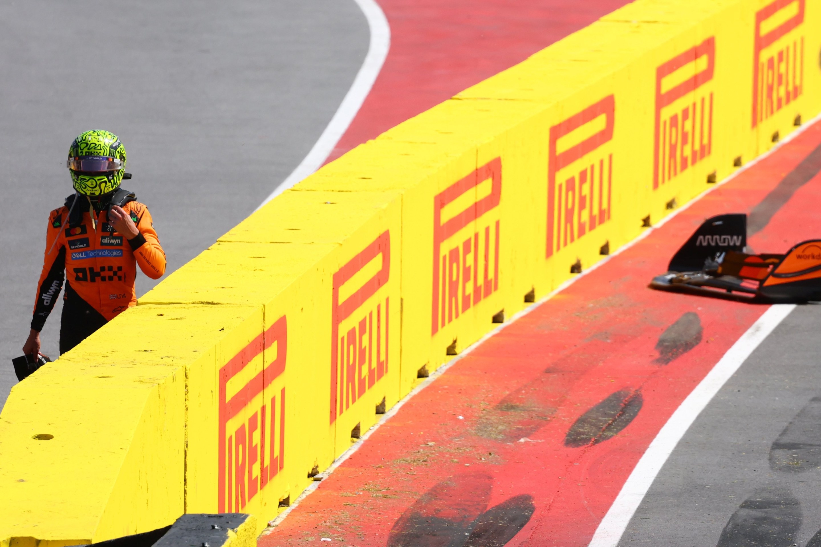 Lando Norris walks away after a crash during the F1 Grand Prix of Canada.