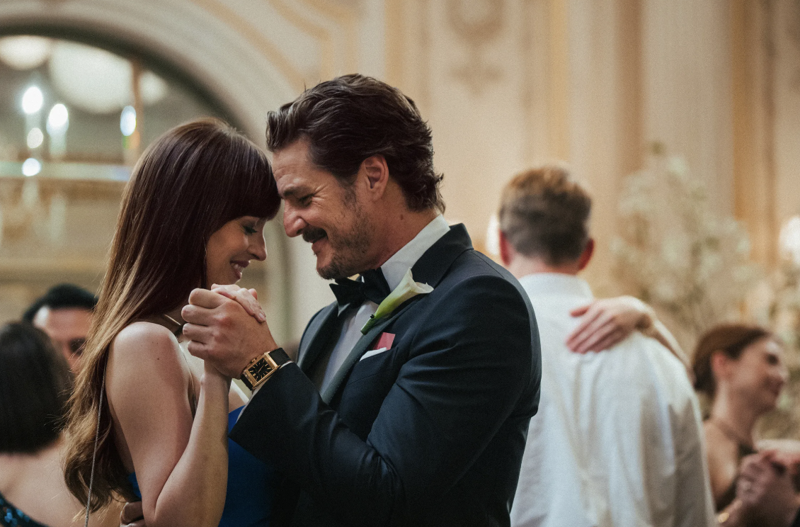 dakota johnson and pedro pascal slow dance at a wedding in materialists