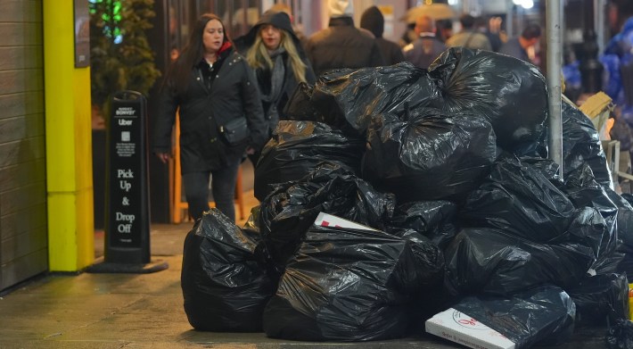 Despite there are new container rules in New York City, which has established a special unit to combat rats, piles of trash are seen on the sidewalks on December 18, 2024 in New York, USA.