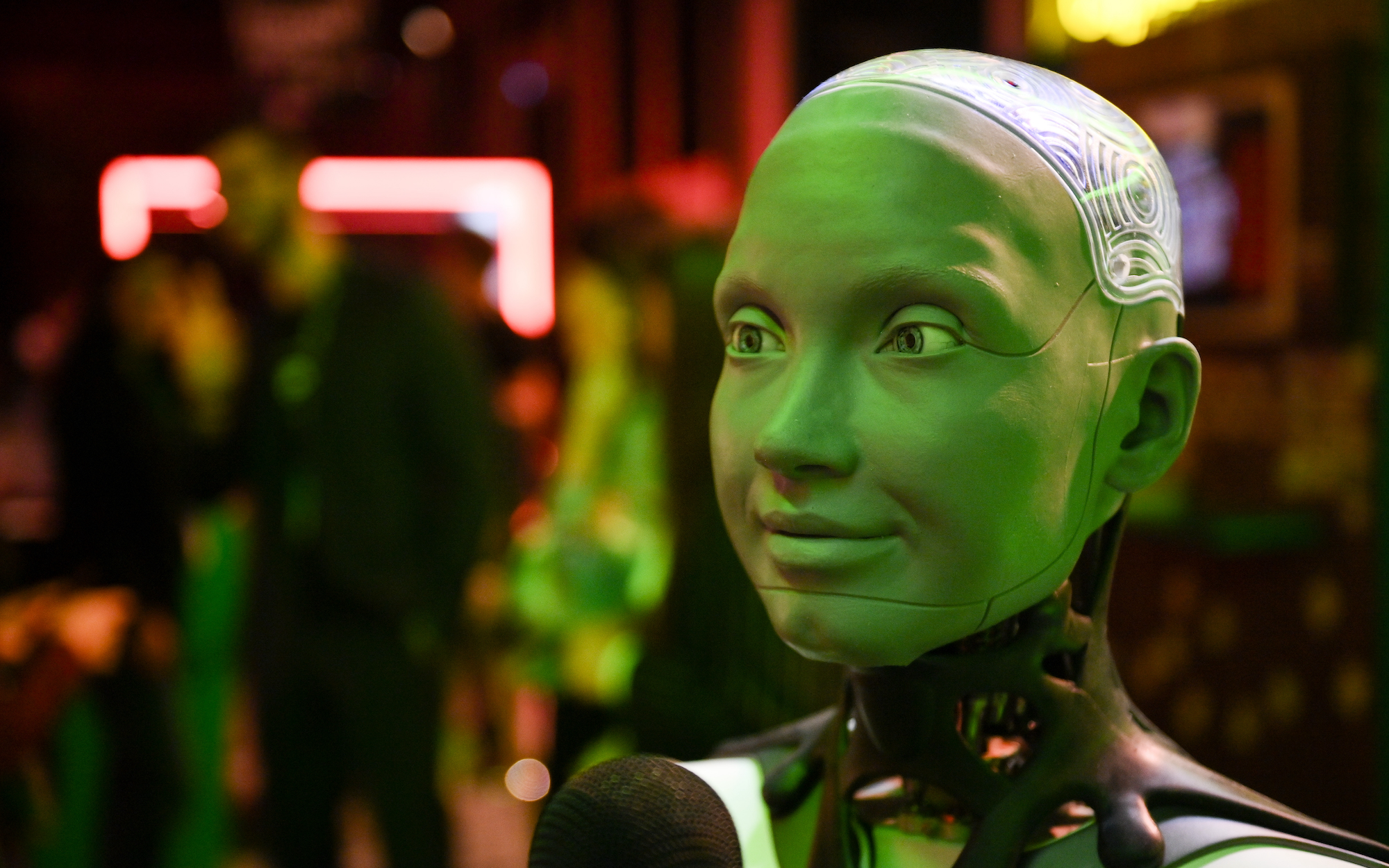 AI-Powered Robot interacts with People during the Italian Tech Week 2024 at OGR Officine Grandi Riparazioni on September 26, 2024 in Turin, Italy.