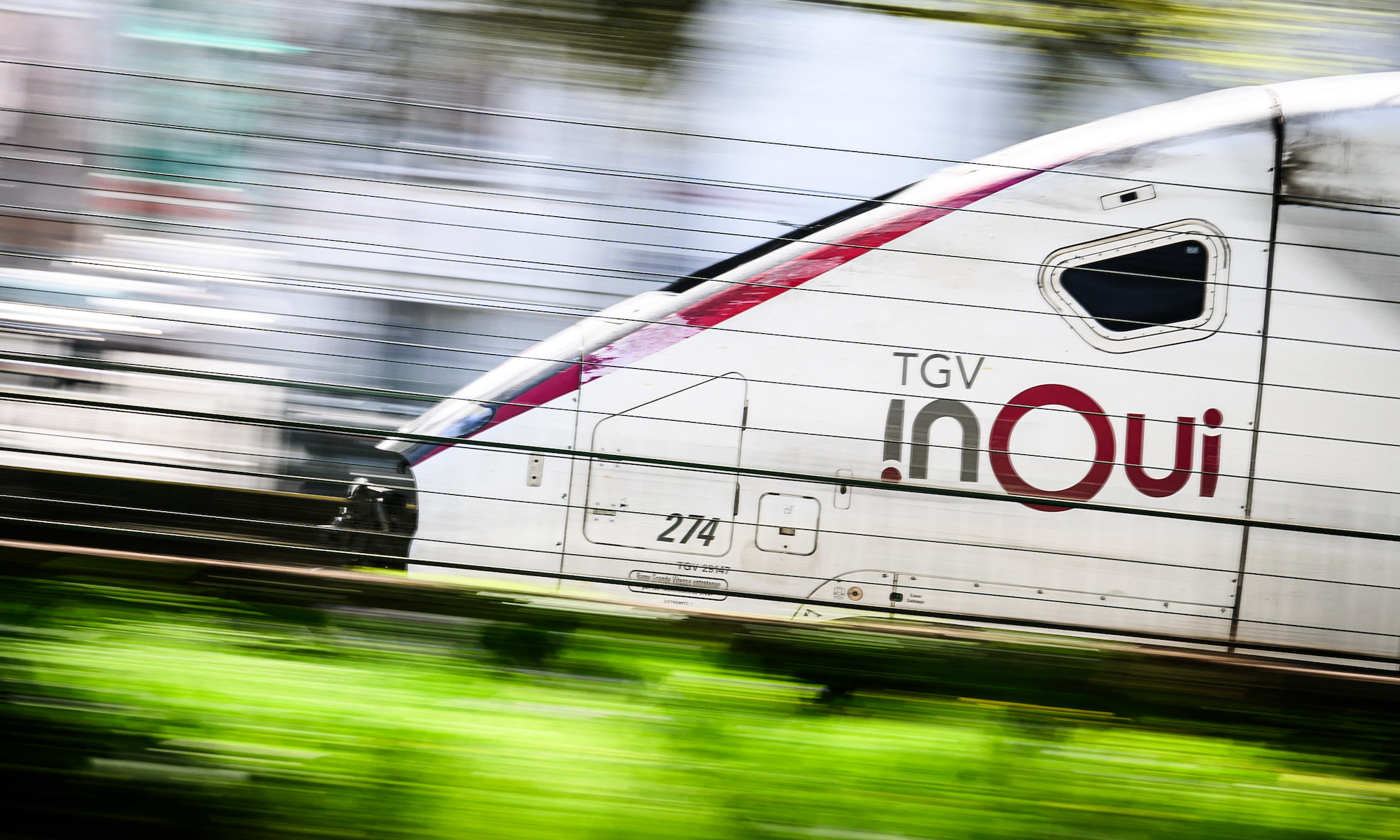 This photograph shows a TGV inoui high speed train of the French national SNCF rail company SNCF running in Nantes, western France, on April 4, 2025.