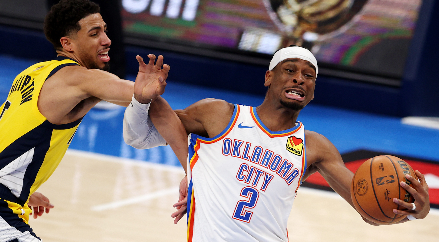 Shai Gilgeous-Alexander #2 of the Oklahoma City Thunder drives to the basket against Tyrese Haliburton #0 of the Indiana Pacers during the fourth quarter in Game One of the 2025 NBA Finals