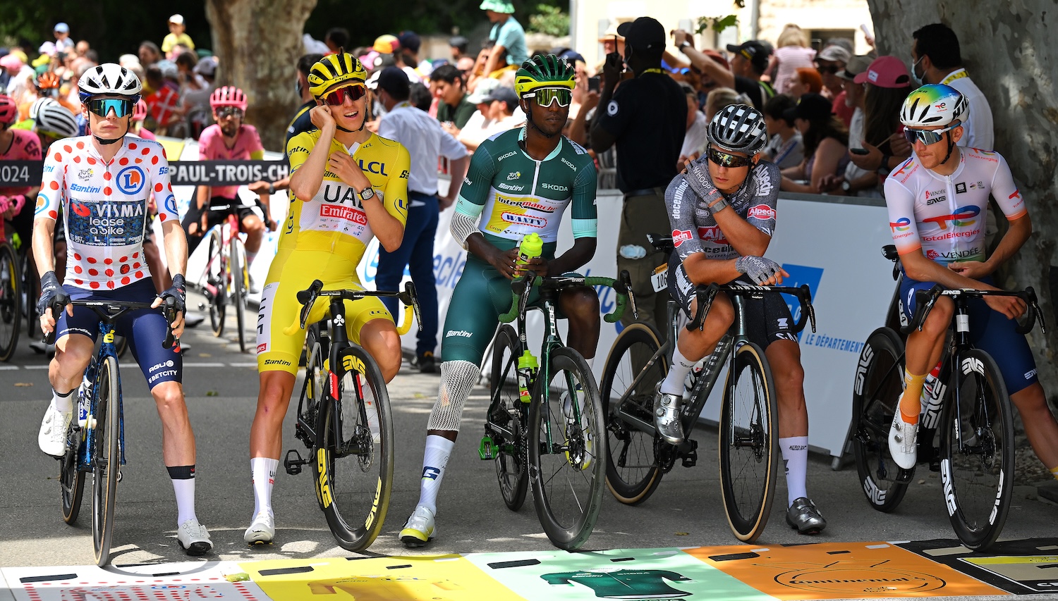 SAINT-PAUL-TROIS-CHATEAUX, FRANCE - JULY 17: (L-R) Jonas Vingegaard Hansen of Denmark and Team Visma | Lease a Bike - Polka dot Mountain Jersey, Tadej Pogacar of Slovenia and UAE Team Emirates - Yellow Leader Jersey, Biniam Girmay of Eritrea and Team Intermarche - Wanty - Green Sprint Jersey, Jasper Philipsen of Belgium and Team Alpecin - Deceuninck and Thomas Gachignard of France and Team TotalEnergies prior to the 111th Tour de France 2024, Stage 17 a 177.8km stage from Saint-Paul-Trois-Chateaux to Superdevoluy 1500m / #UCIWT / on July 17, 2024 in Saint-Paul-Trois-Chateaux, France. (Photo by Tim de Waele/Getty Images)