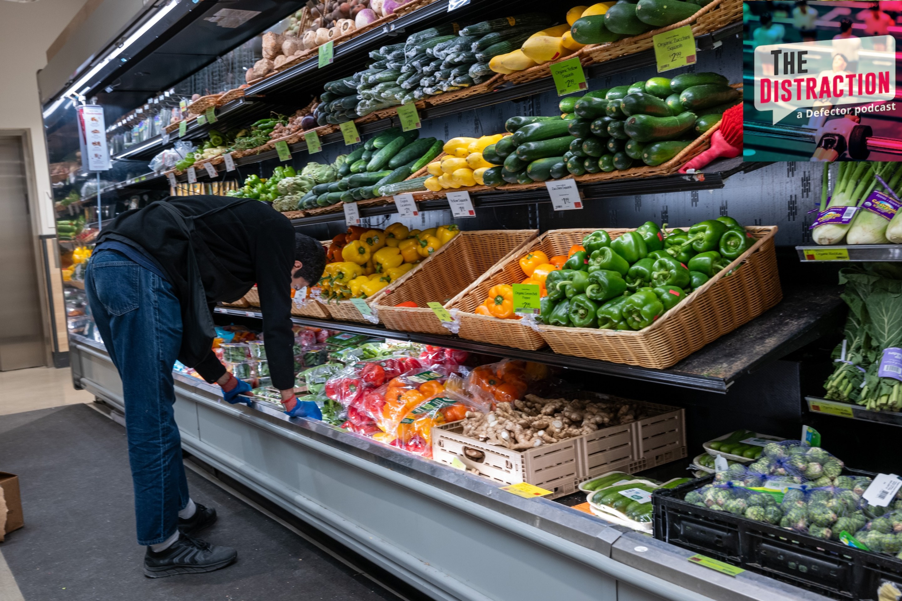 A worker stocks food items at a Whole Foods Market grocery store in Manhattan on December 17, 2024.