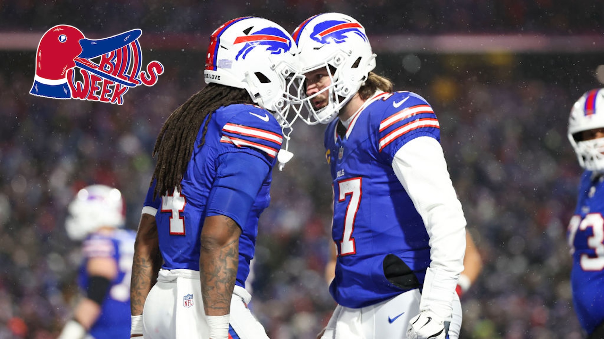Josh Allen #17 of the Buffalo Bills celebrates with James Cook #4 of the Buffalo Bills after scoring a touchdown during the second quarter in the AFC Divisional Playoff against the Baltimore Ravens at Highmark Stadium on January 19, 2025 in Orchard Park, New York.