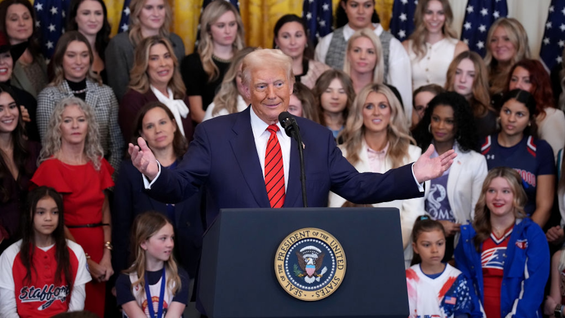 President Donald Trump delivers remarks before signing the “No Men in Women’s Sports” executive order in the East Room at the White House on February 5, 2025 in Washington, DC. The executive order, which Trump signed on National Girls and Women in Sports Day, prohibits transgender women from competing in women’s sports and is the third order he has signed that targets transgender people.