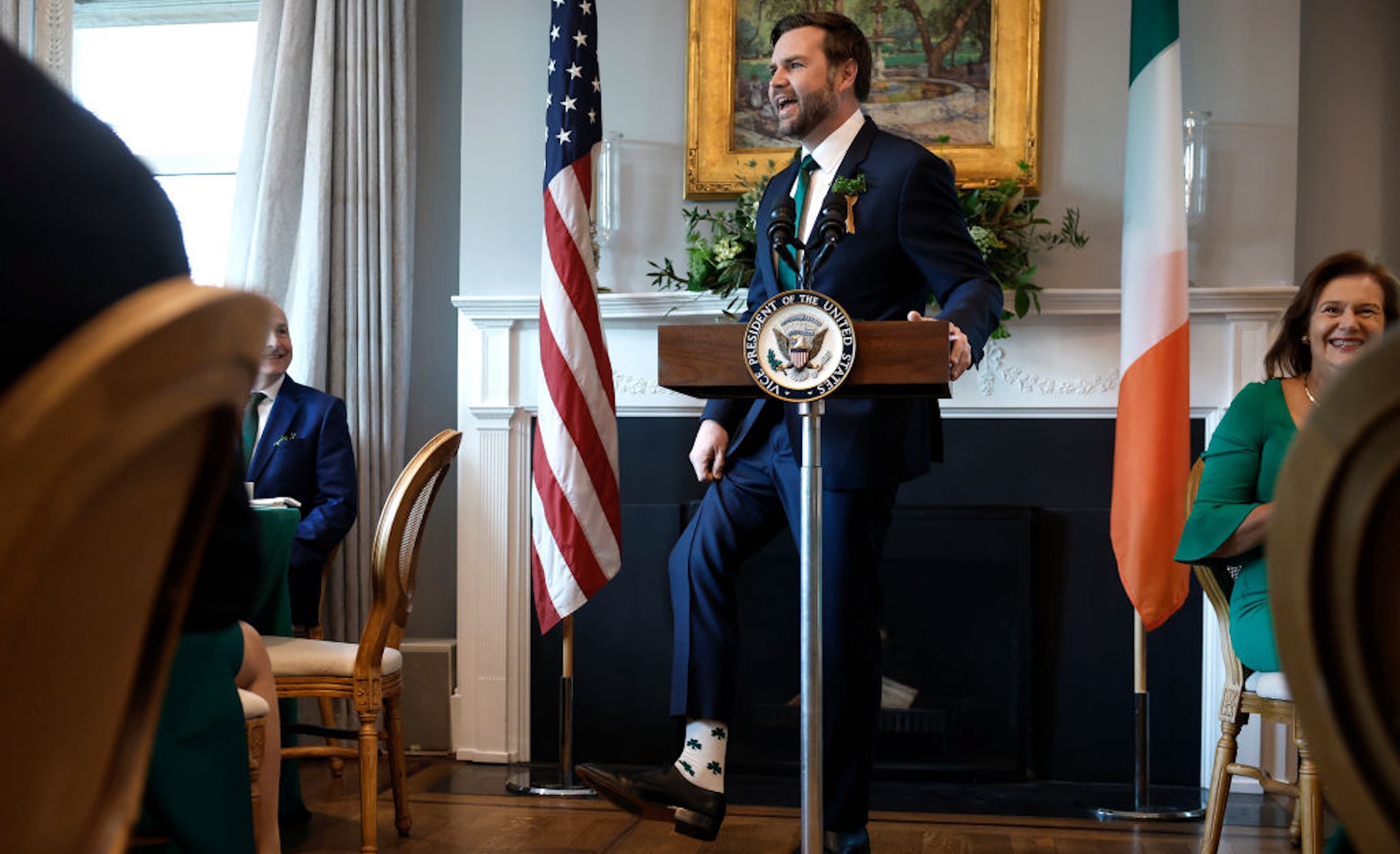 U.S. Vice President JD Vance shows off his shamrock themed socks as he delivers remarks at a St. Patrick's Day breakfast for Irish Taoiseach Micheál Martin at the vice president's residence on March 12, 2025 in Washington, DC. Martin is visiting the United States for the Irish leader's annual St. Patrick's Day visit where he will meet with U.S. President Donald Trump and attend a St. Patrick's Day lunch with congressional leaders.