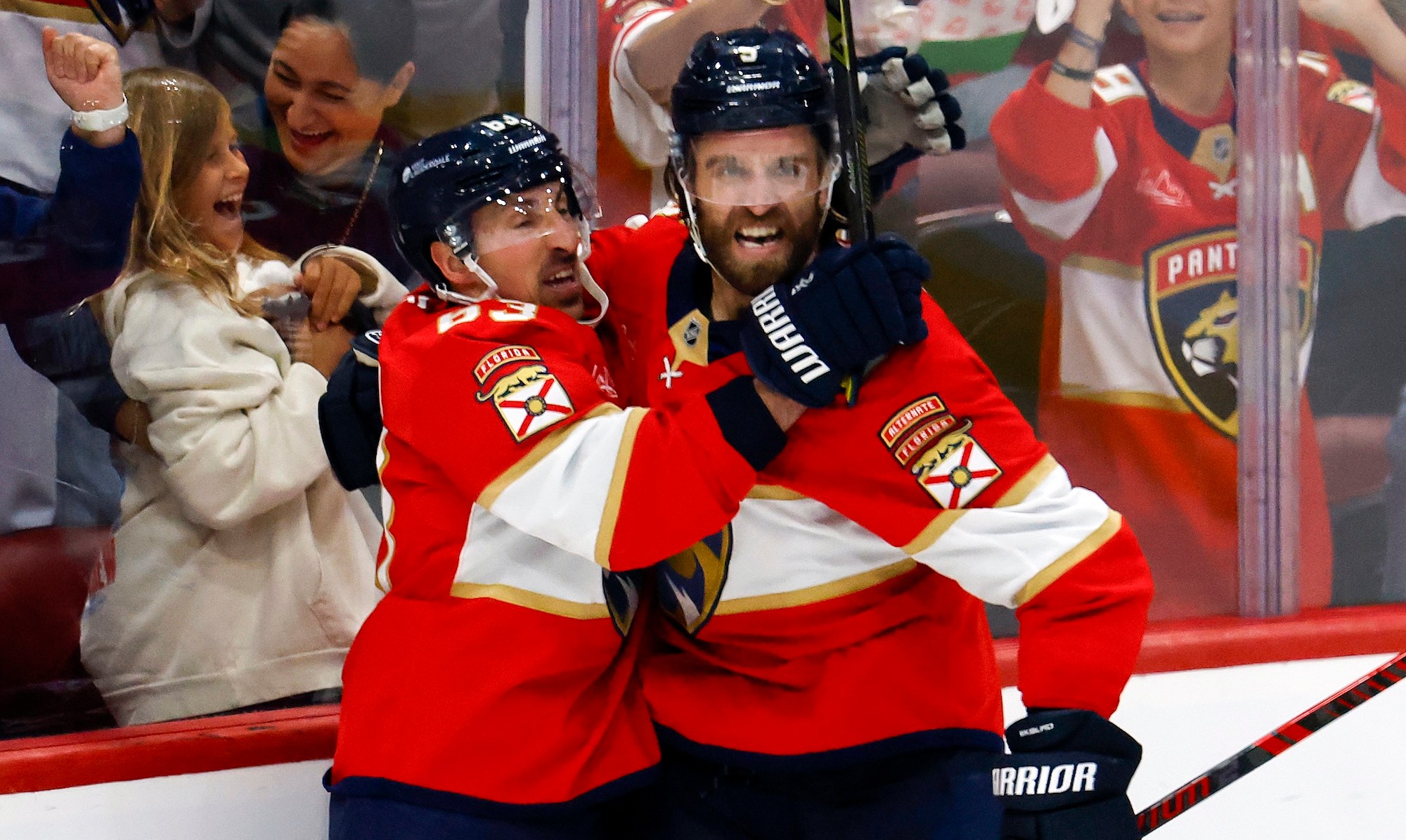 SUNRISE, FL - APRIL 28: Aaron Ekblad #5 celebrates his goal with Brad Marchand #63 of the Florida Panthers against the Tampa Bay Lightning in the third period of Game Four of the First Round of the 2025 NHL Stanley Cup Playoffs at the Amerant Bank Arena on April 28, 2025 in Sunrise, Florida. (Photo by Joel Auerbach/Getty Images) *** Local Caption *** Aaron Ekblad;Brad Marchand