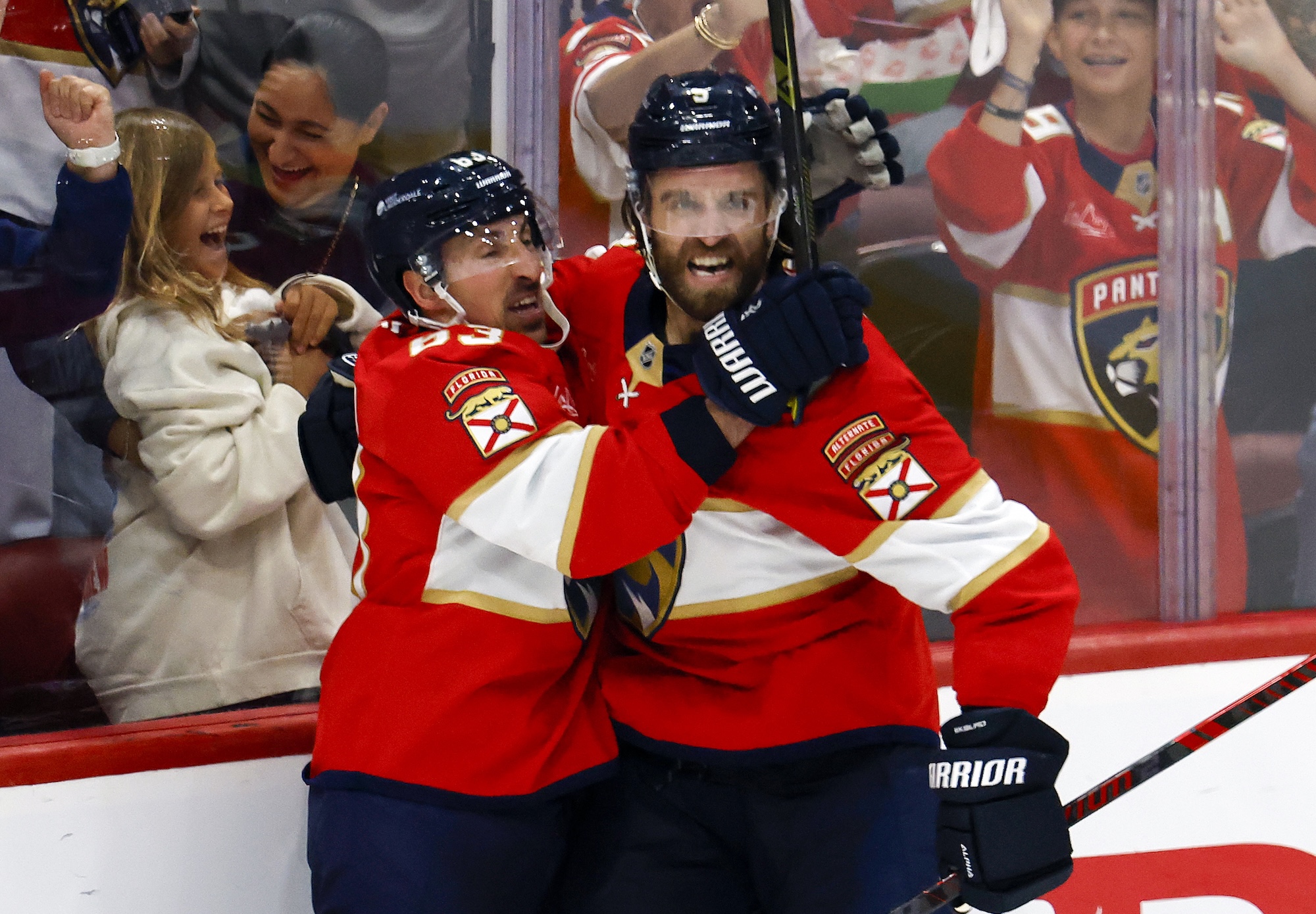 SUNRISE, FL - APRIL 28: Aaron Ekblad #5 celebrates his goal with Brad Marchand #63 of the Florida Panthers against the Tampa Bay Lightning in the third period of Game Four of the First Round of the 2025 NHL Stanley Cup Playoffs at the Amerant Bank Arena on April 28, 2025 in Sunrise, Florida. (Photo by Joel Auerbach/Getty Images) *** Local Caption *** Aaron Ekblad;Brad Marchand