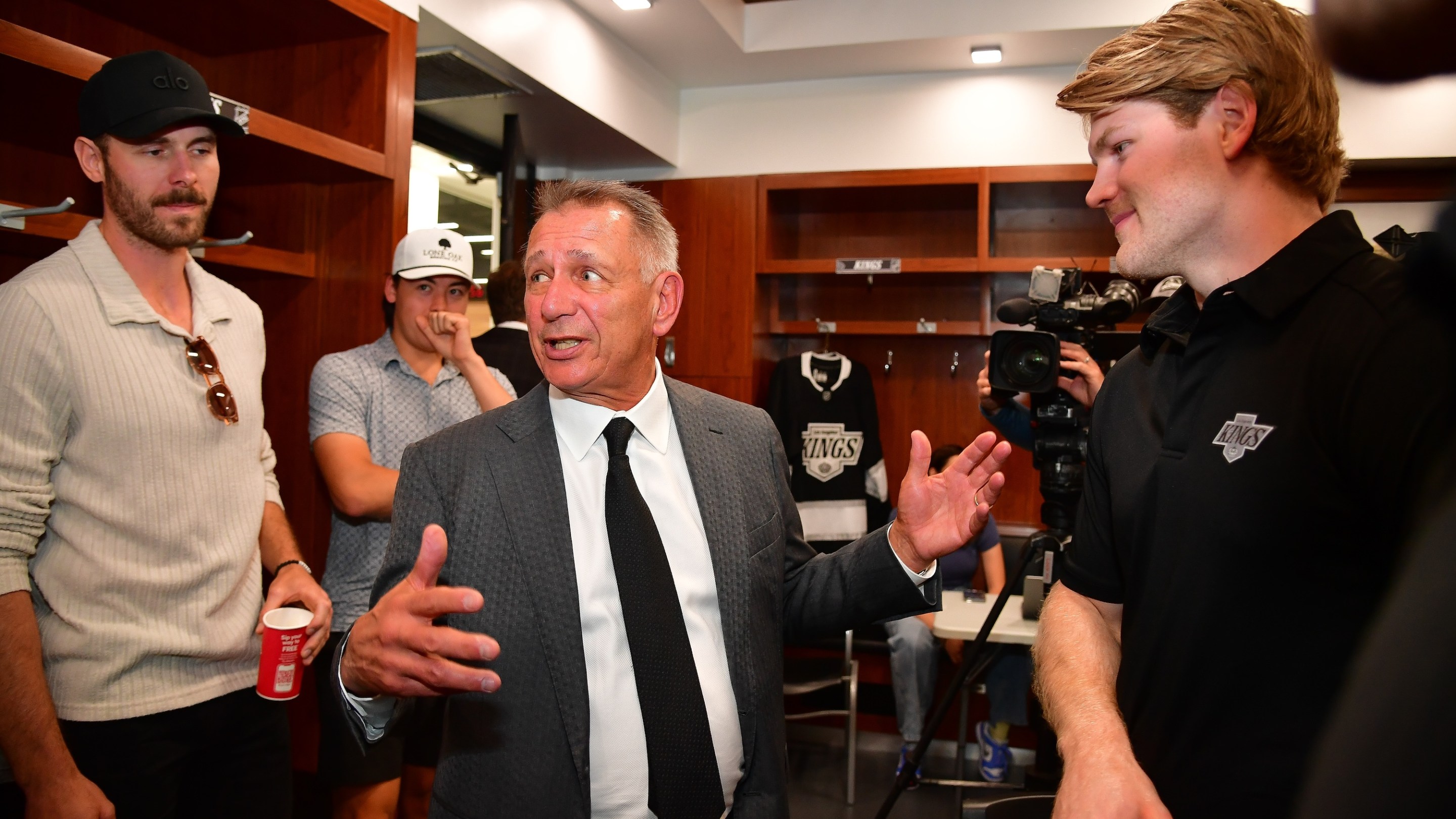 El Segundo, CA - May 15: Los Angeles Kings general manager Ken Holland meets with Joel Edmundson, Jordan Spence and Warren Foegele at Toyota Sports Performance Center on May 15, 2025 in El Segundo, California. (Photo by Gary A. Vasquez/NHLI via Getty Images)