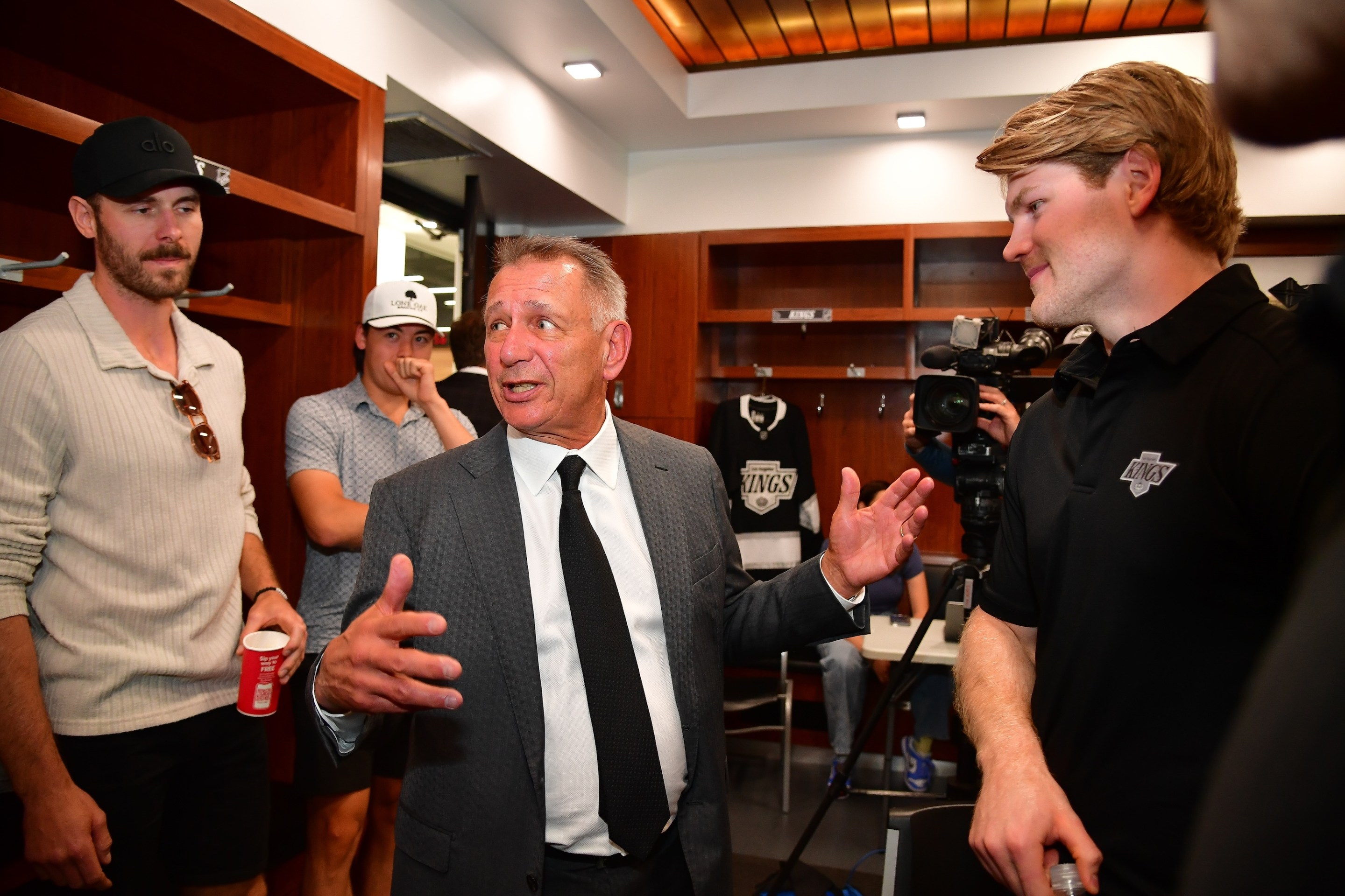 El Segundo, CA - May 15: Los Angeles Kings general manager Ken Holland meets with Joel Edmundson, Jordan Spence and Warren Foegele at Toyota Sports Performance Center on May 15, 2025 in El Segundo, California. (Photo by Gary A. Vasquez/NHLI via Getty Images)