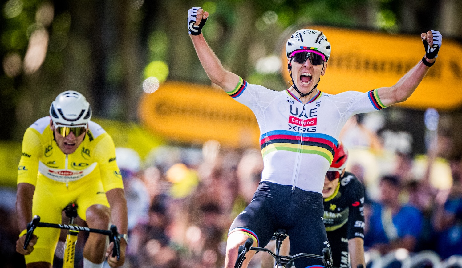 Slovenian Tadej Pogacar of UAE Team Emirates celebrates as he crosses the finish line to win the fourth stage of the 2025 Tour de France cycling, Amien Metropole - Rouen (173 km), on Tuesday 08 July 2025 in France. The 112th edition of the Tour de France starts on Saturday 5 July in Lille, France, and will finish in Paris, France on the 27th of July. BELGA PHOTO JASPER JACOBS (Photo by JASPER JACOBS / BELGA MAG / Belga via AFP)