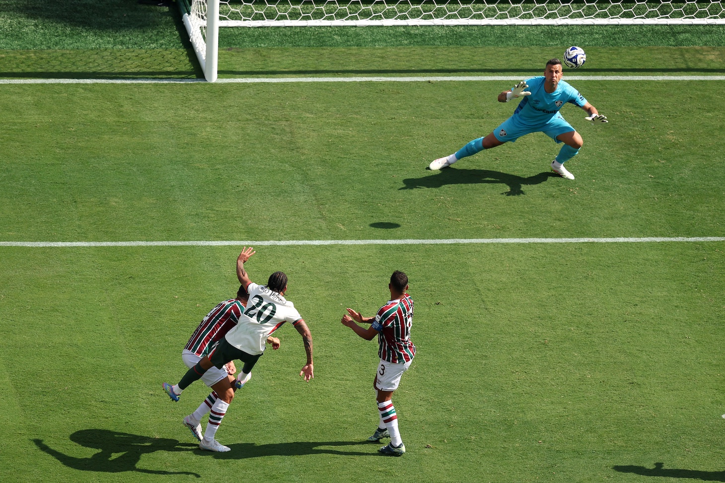Fluminense's Brazilian goalkeeper #01 Fabio concedes a second goal by Chelsea's Brazilian forward #20 Joao Pedro (2-L)during the FIFA Club World Cup 2025 semifinal football match between Brazil's Fluminense and England's Chelsea at the MetLife stadium in East Rutherford, New Jersey on July 8, 2025.