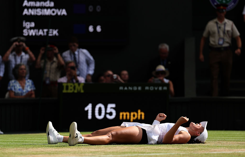 Iga Swiatek of Poland celebrates winning Championship point against Amanda Anisimova of United States in the Ladies' Singles Final on day thirteen of The Championships Wimbledon 2025 at All England Lawn Tennis and Croquet Club on July 12, 2025 in London, England.