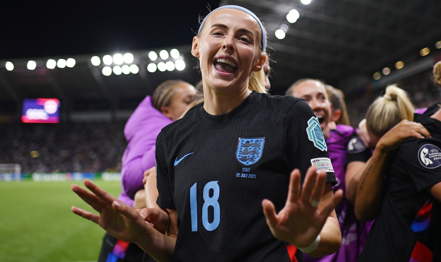 Chloe Kelly of England celebrates after scoring her team's second goal from a rebound following a saved penalty in extra-time during the UEFA Women's EURO 2025 Semi-Final match between England and Italy at Stade de Geneve on July 22, 2025 in Geneva, Switzerland.