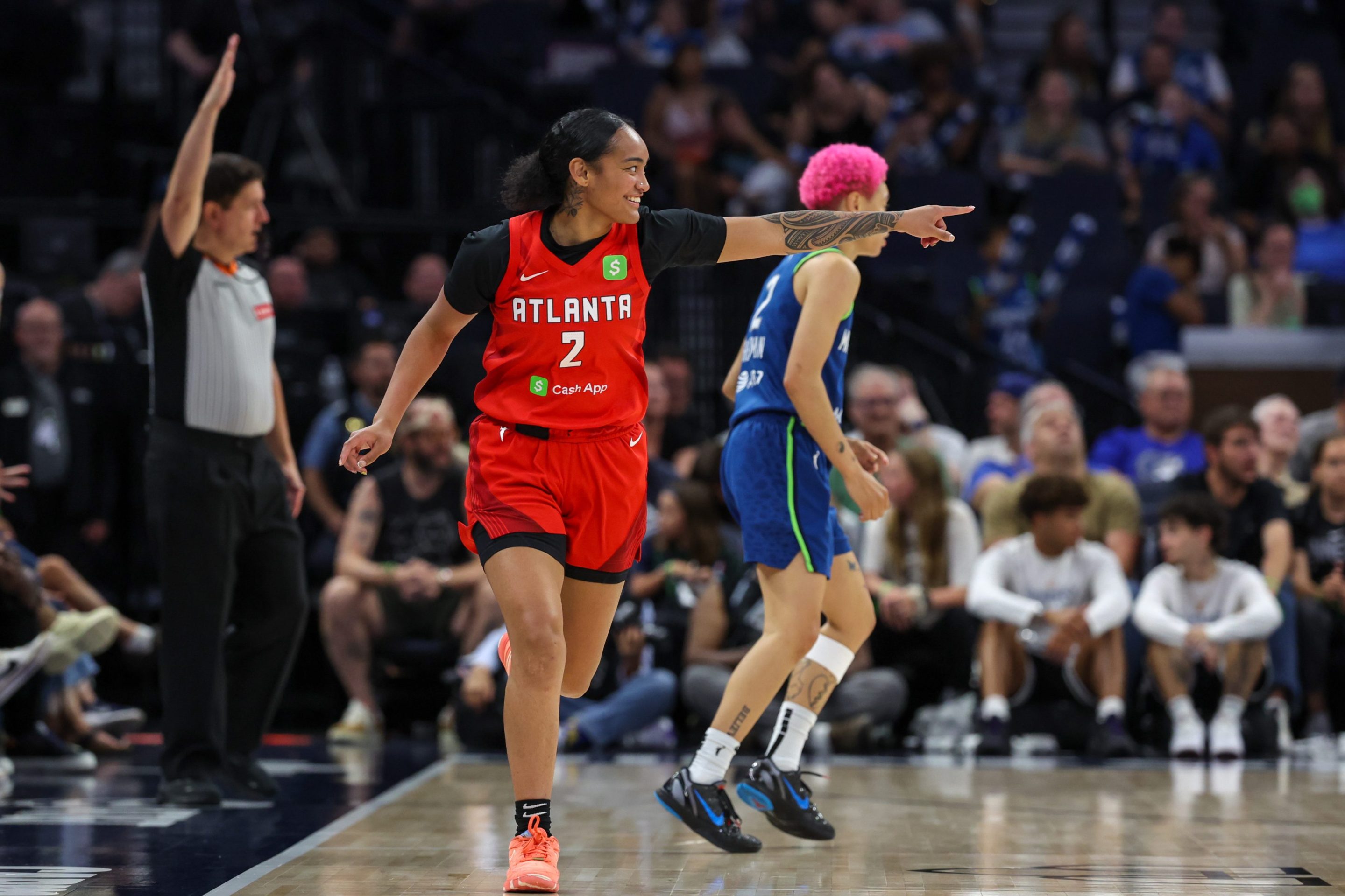 Te-Hina Paopao #2 of the Atlanta Dream reacts after a made three-point basket at Target Center on July 27, 2025 in Minneapolis, Minnesota.