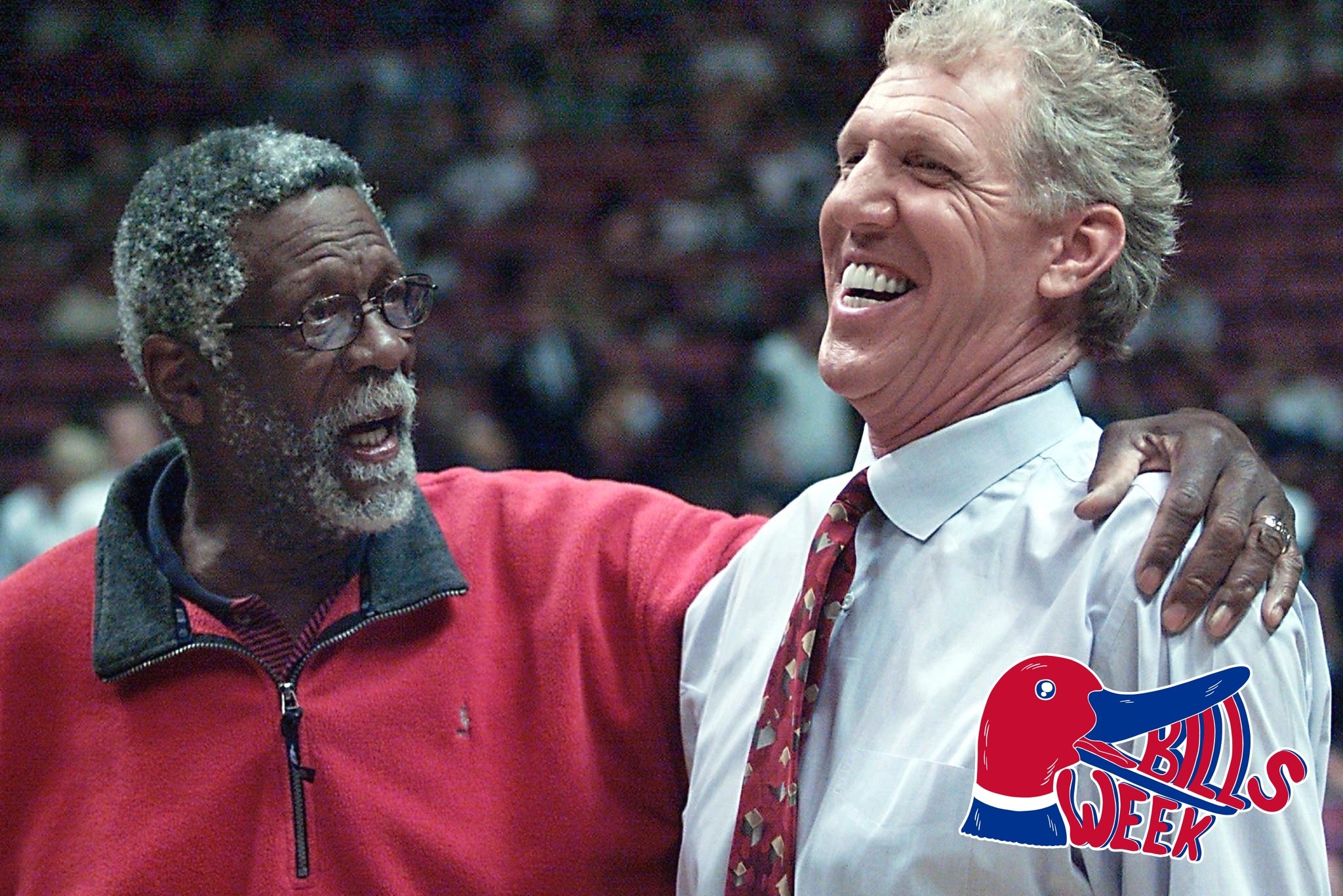 EAST RUTHERFORD - JUNE 9: NBA legends Bill Russell and Bill Walton talk before game three of the NBA Finals on June 9, 2002 at Continental Airlines Arena in East Rutherford, New Jersey. The New Jersey Nets are attempting to stop the Los Angeles Lakers from winning their third championship in a row. AFP PHOTO/MATT CAMPBELL (Photo credit should read MATT CAMPBELL/AFP via Getty Images)