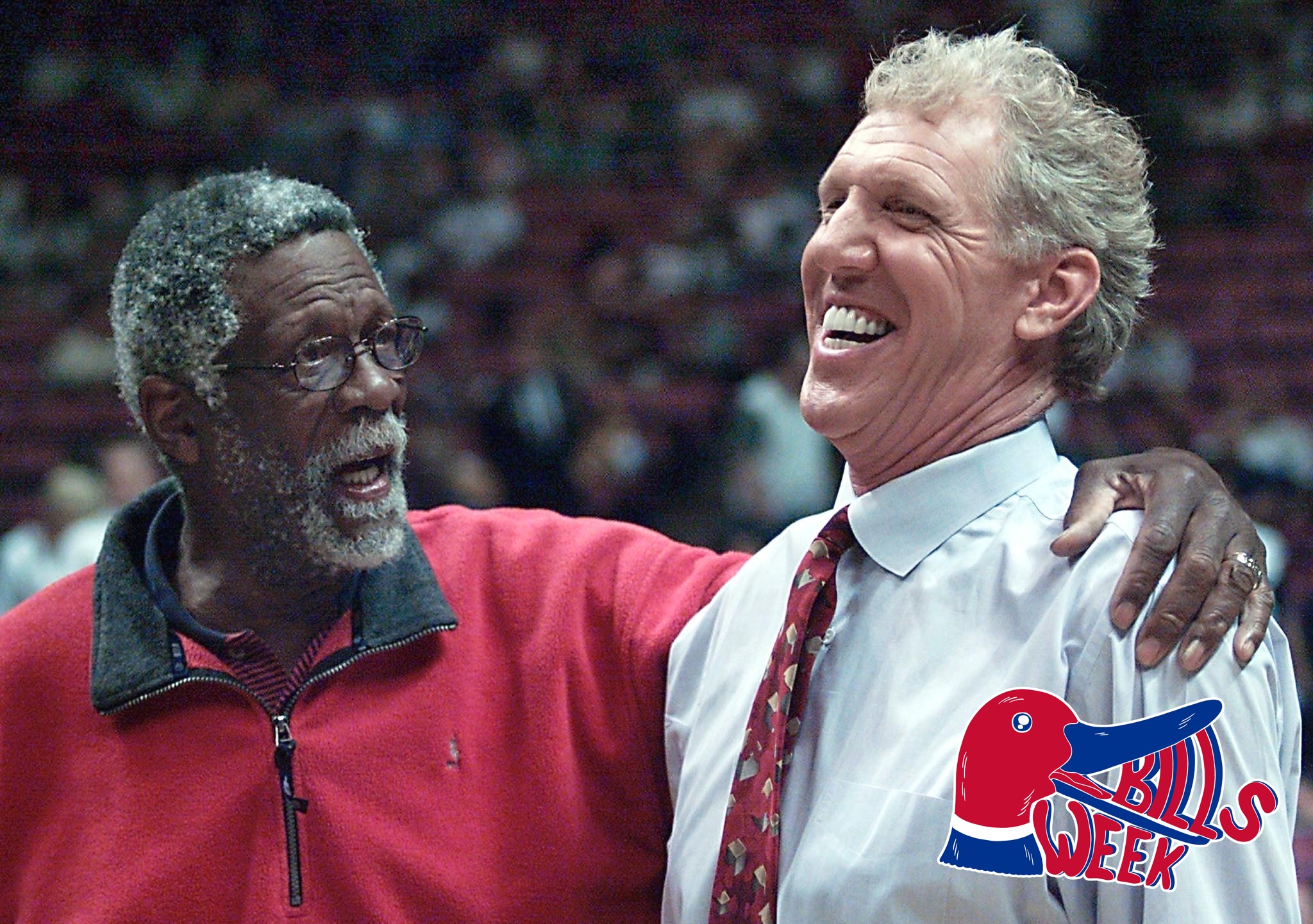 EAST RUTHERFORD - JUNE 9: NBA legends Bill Russell and Bill Walton talk before game three of the NBA Finals on June 9, 2002 at Continental Airlines Arena in East Rutherford, New Jersey. The New Jersey Nets are attempting to stop the Los Angeles Lakers from winning their third championship in a row. AFP PHOTO/MATT CAMPBELL (Photo credit should read MATT CAMPBELL/AFP via Getty Images)