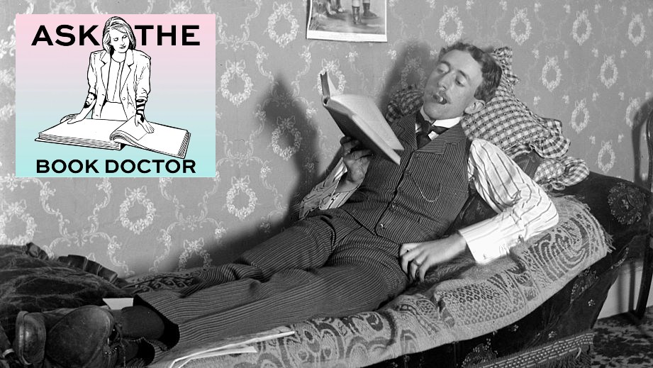 black and white photo of a man with a pipe lounging with a book