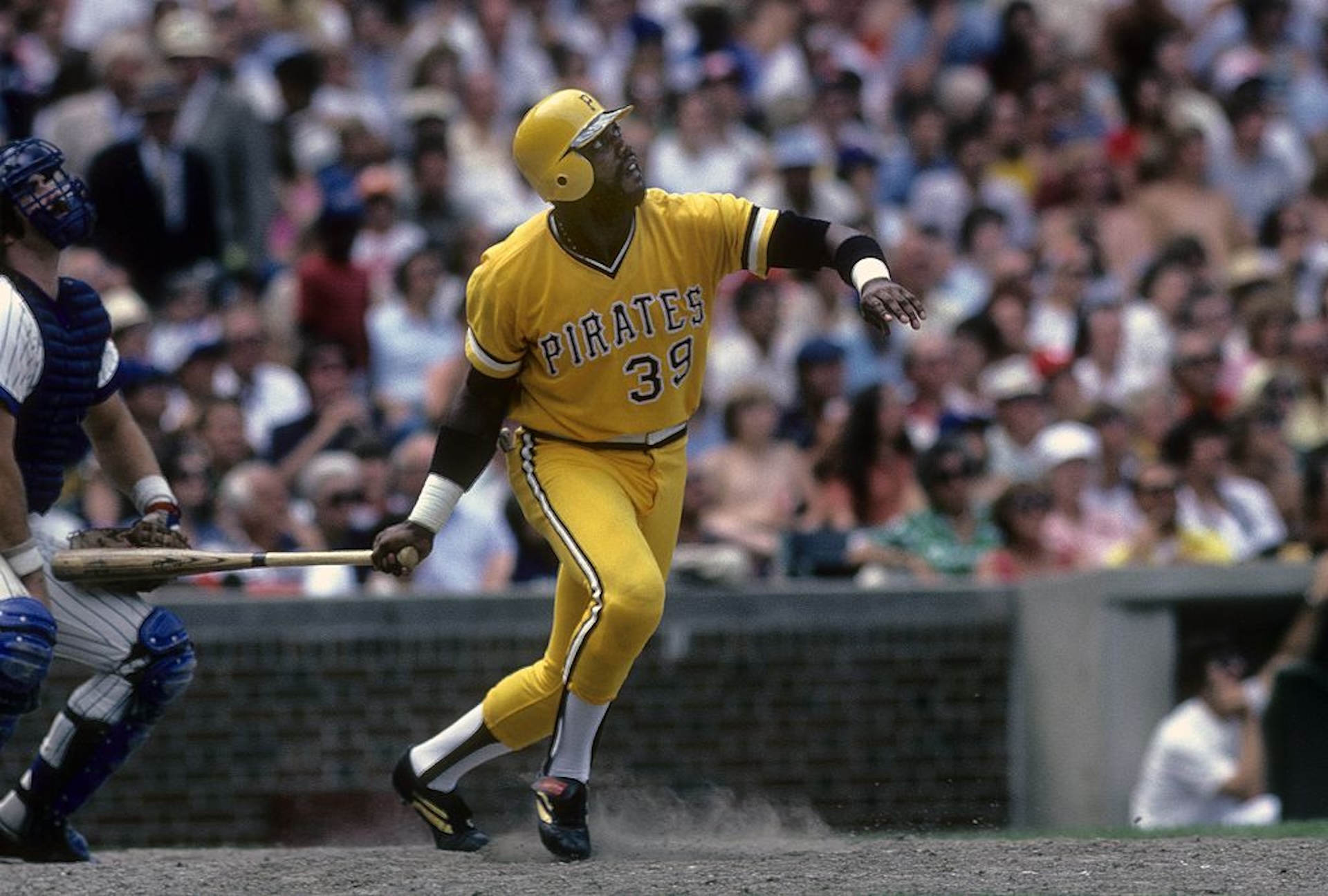 Outfielder Dave Parker #39 of the Pittsburgh Pirates swings and watches the flight of his ball against the Chicago Cubs during a circa 1970's Major League Baseball game at Wrigley Field in Chicago, Illinois. Parker played for the Pirates from 1973-83.