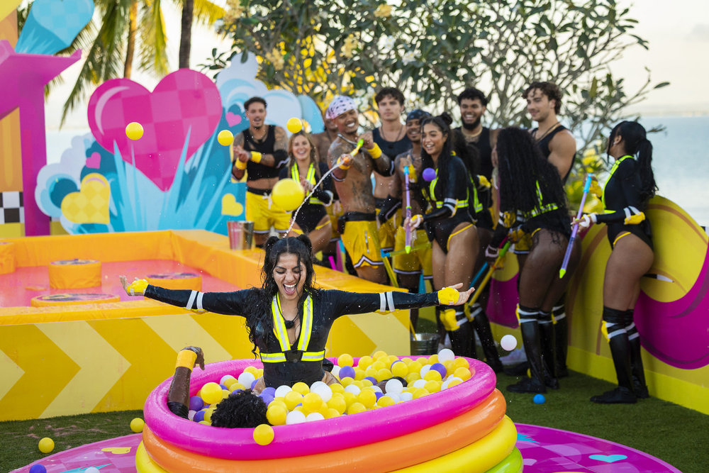 Love Island contestants near a ball pit