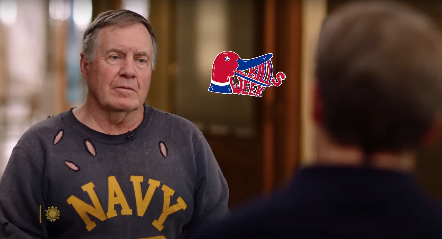 Bill Belichick with holes in his shirt