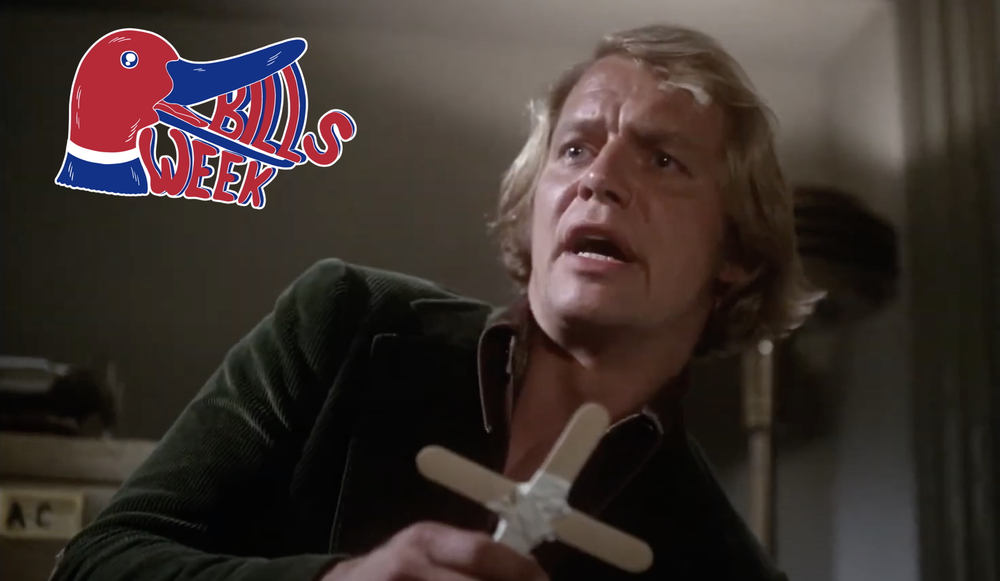 The actor David Soul holding a wooden cross and yelling "Bill!"